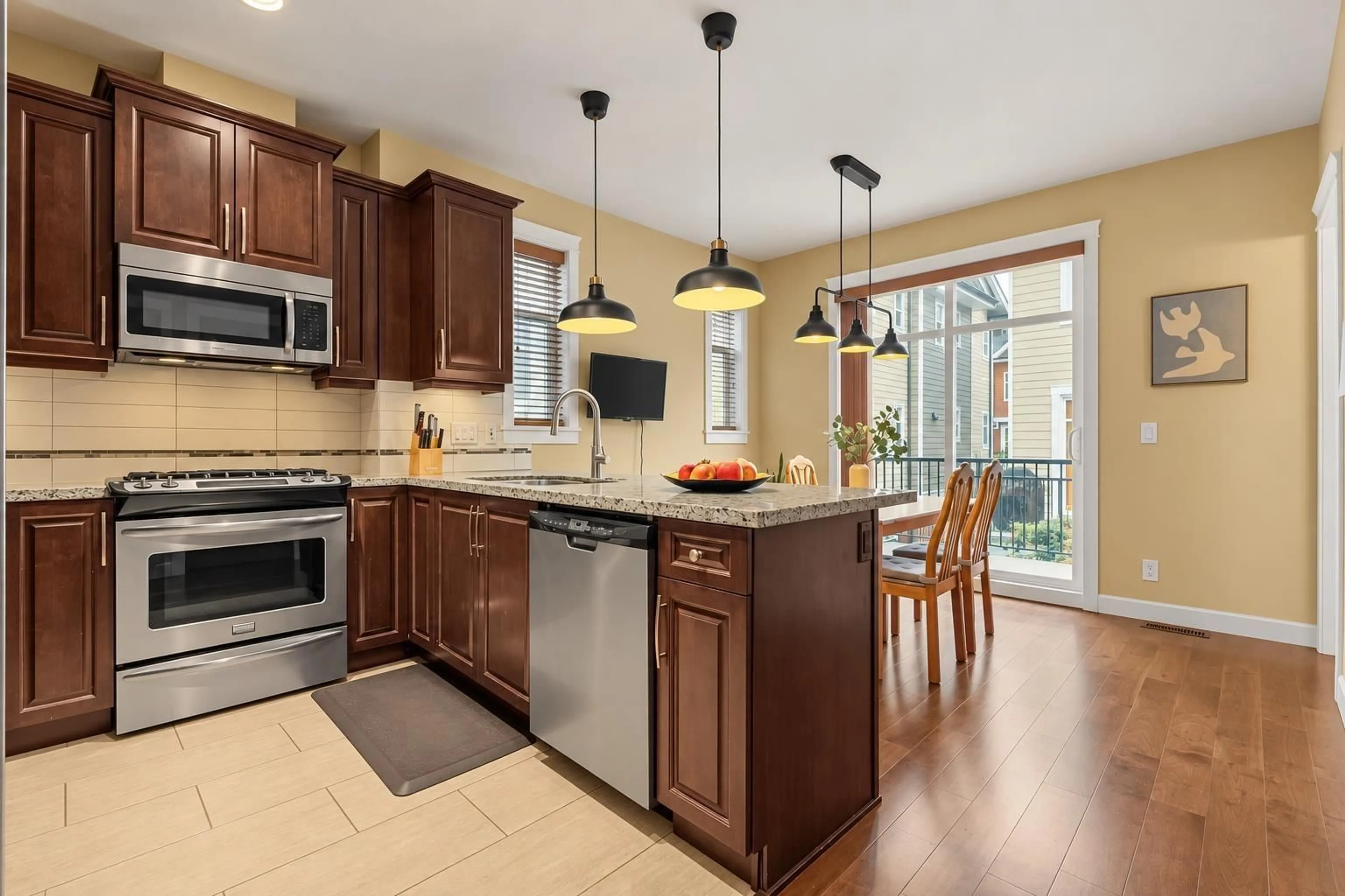Open concept kitchen, ceramic/tile floor for 94 - 8068 207 STREET, Langley British Columbia V2Y0M9