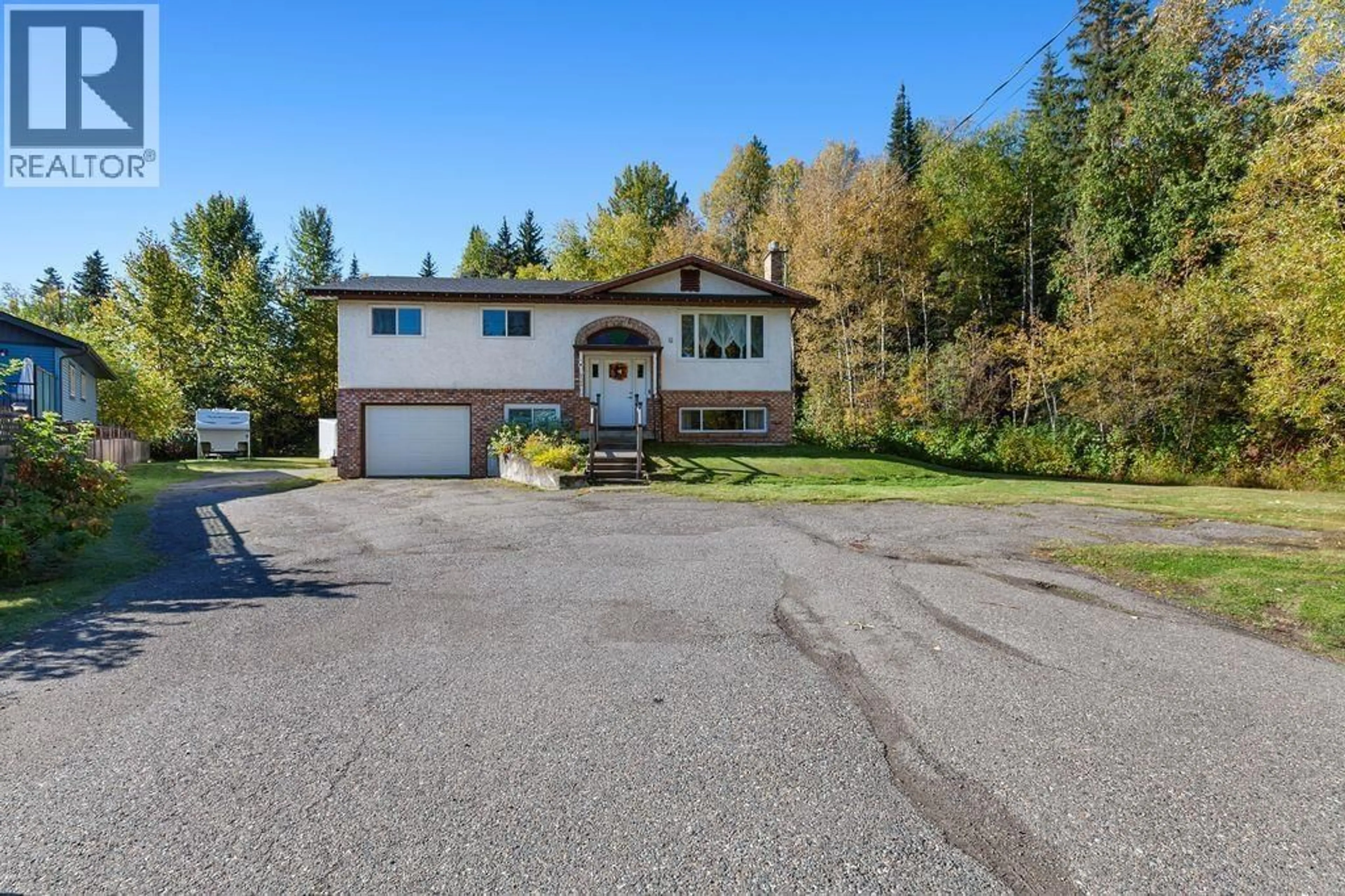 A pic from outside/outdoor area/front of a property/back of a property/a pic from drone, unknown for 4705 CHIEF LAKE ROAD, Prince George British Columbia V2K5P9