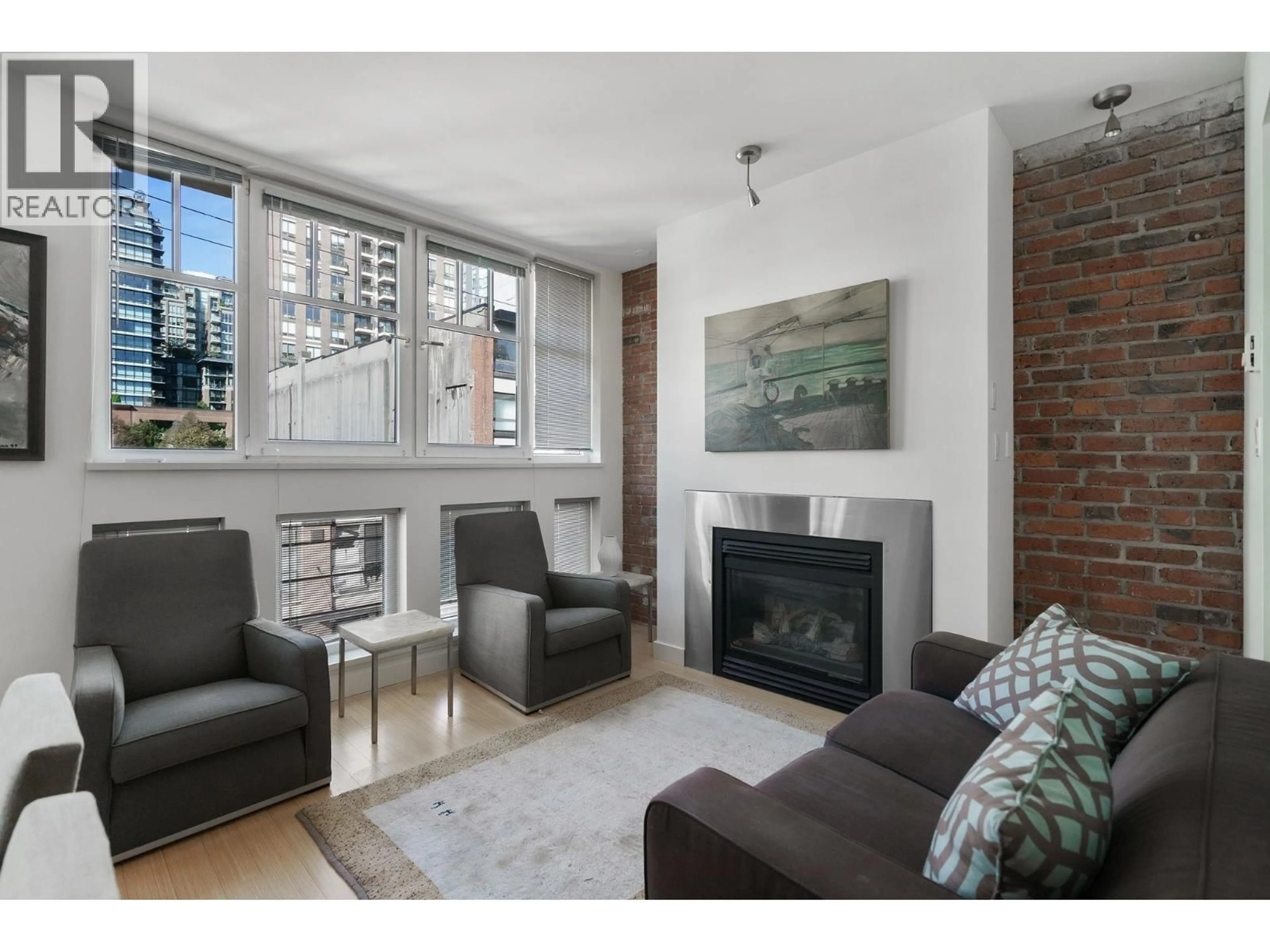 Living room with furniture, unknown for 402 - 1072 HAMILTON STREET, Vancouver British Columbia V6B2R9