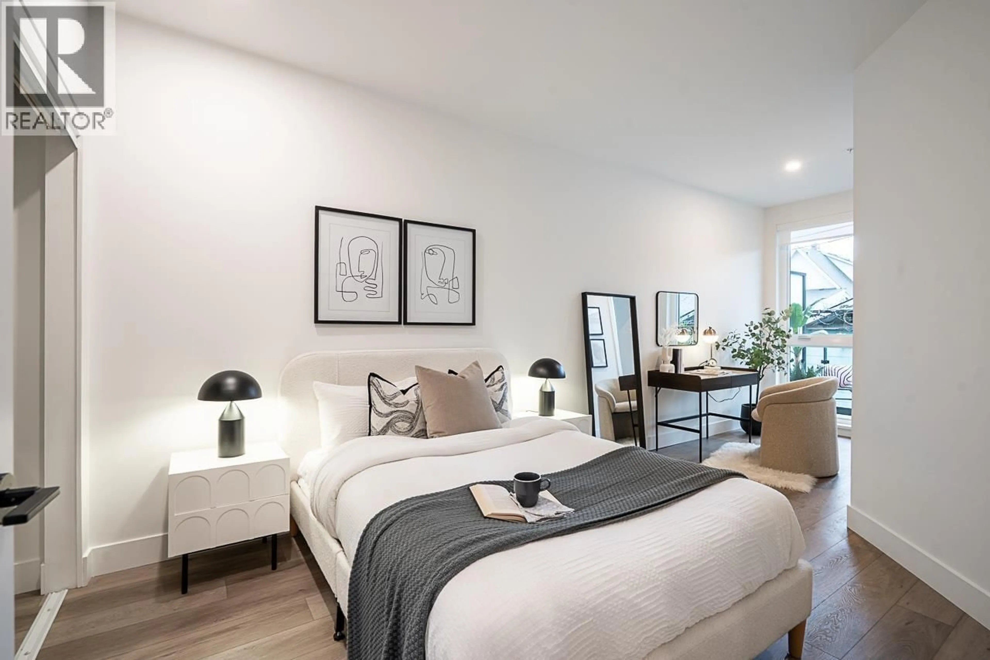 Bedroom with bed, wood/laminate floor for 209 - 422 LAKEWOOD DRIVE, Vancouver British Columbia V5L0E8
