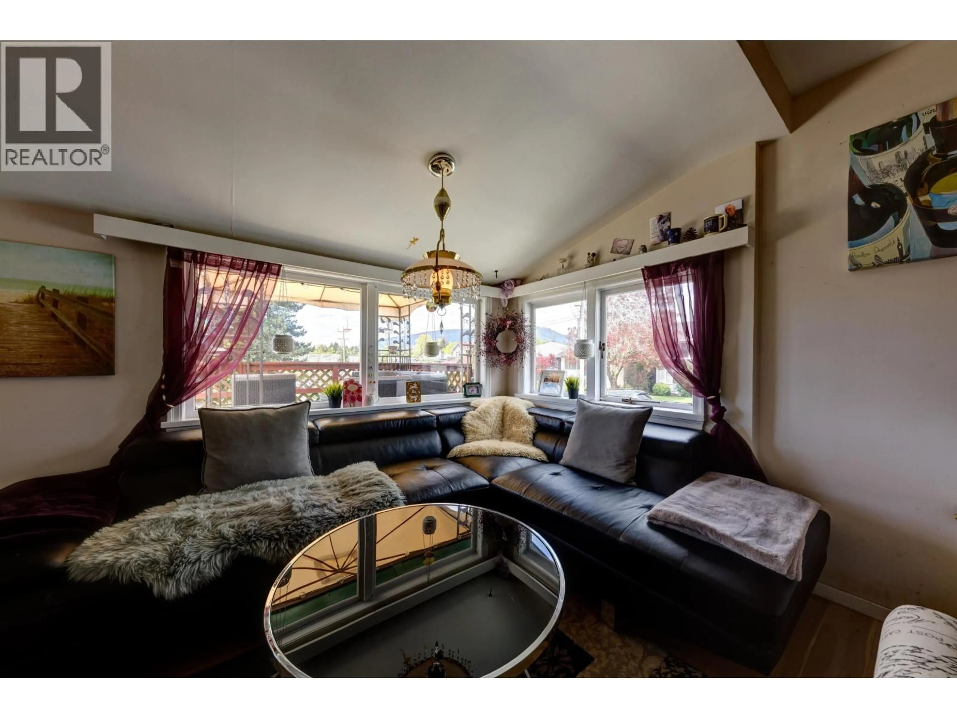 Living room with furniture, wood/laminate floor for 2057 MAHON AVENUE, North Vancouver British Columbia V7M2T6