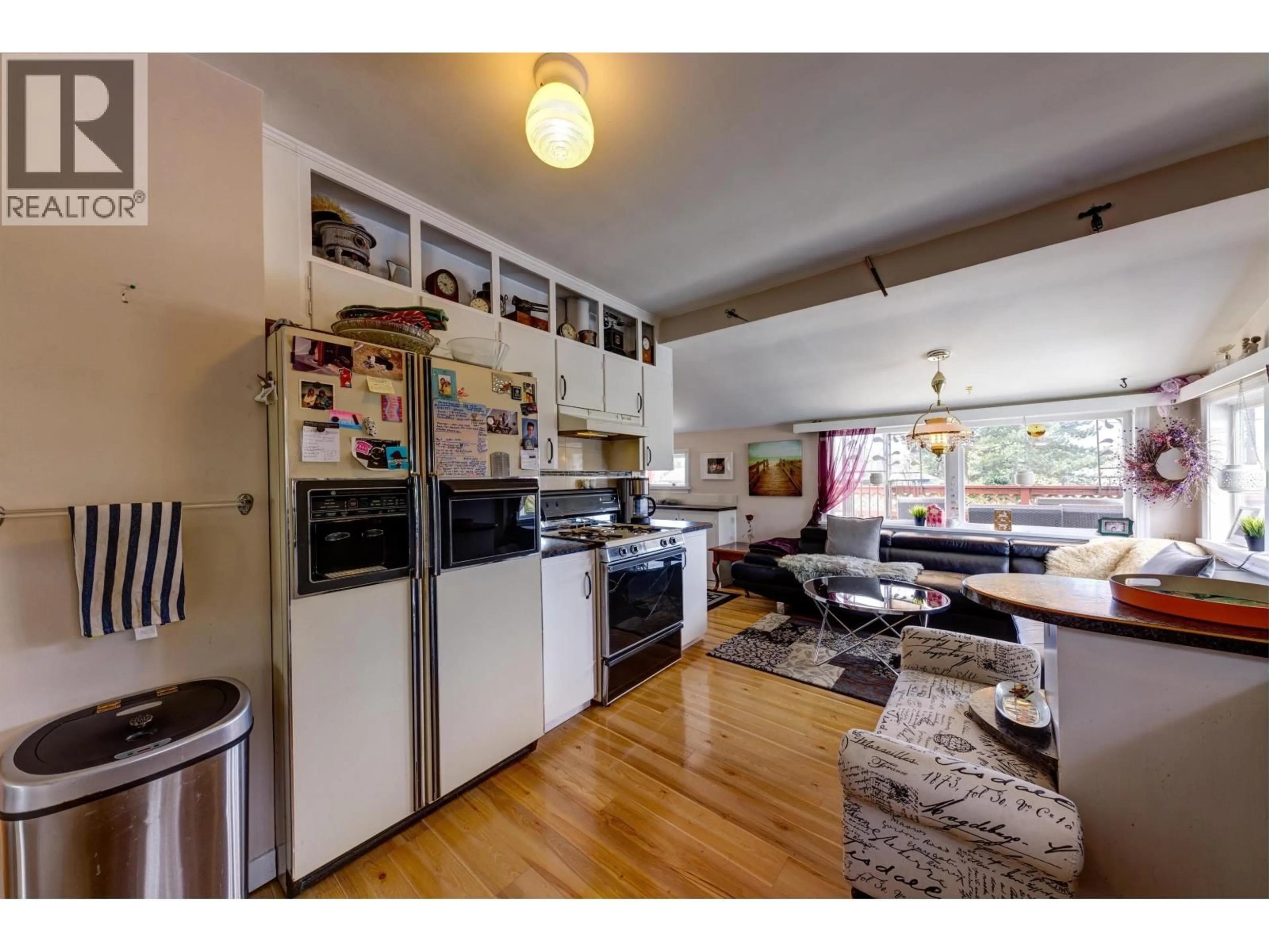 Open concept kitchen, wood/laminate floor for 2057 MAHON AVENUE, North Vancouver British Columbia V7M2T6