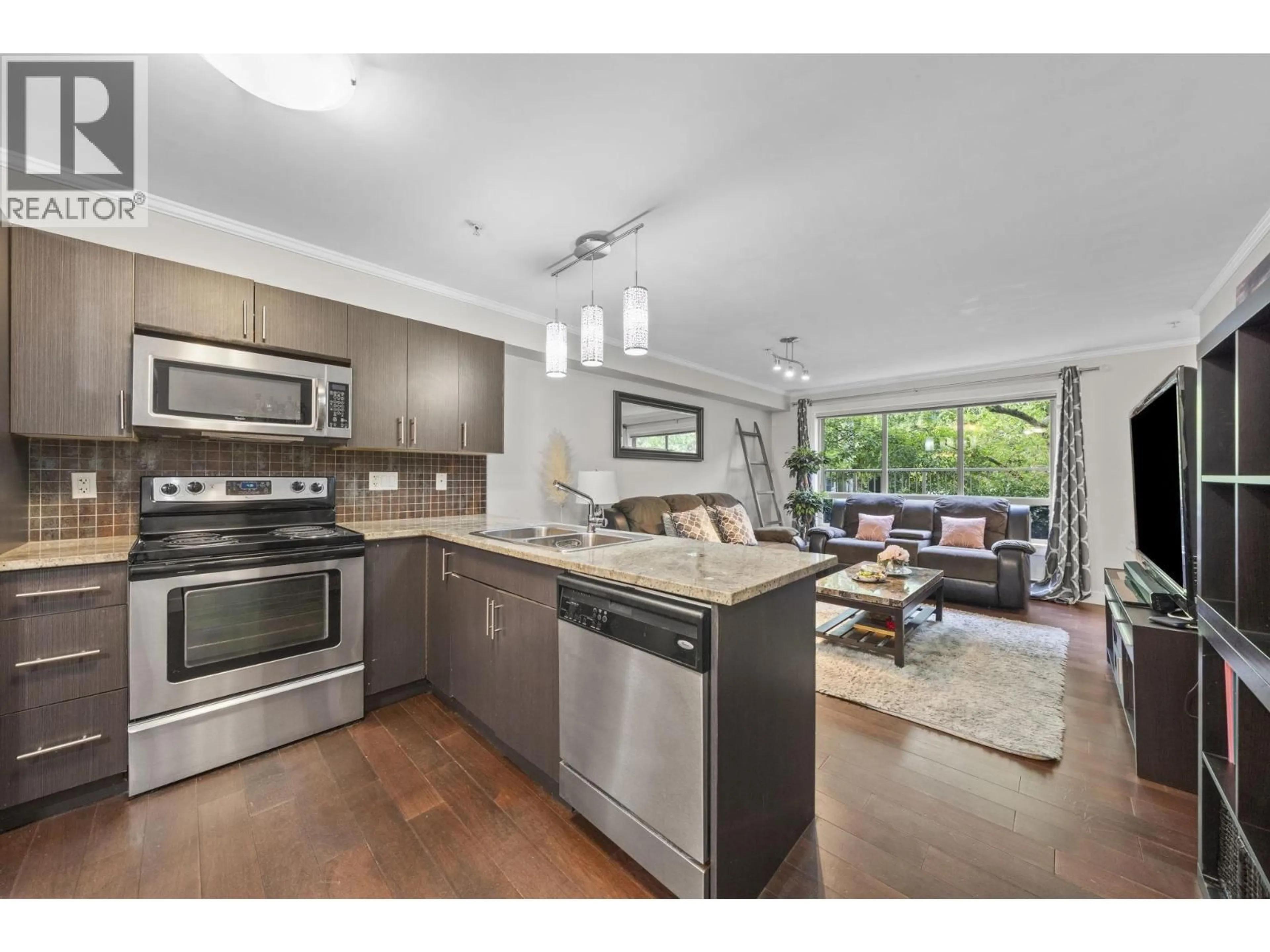 Open concept kitchen, wood/laminate floor for 102 - 2228 WELCHER AVENUE, Port Coquitlam British Columbia V3C1X3
