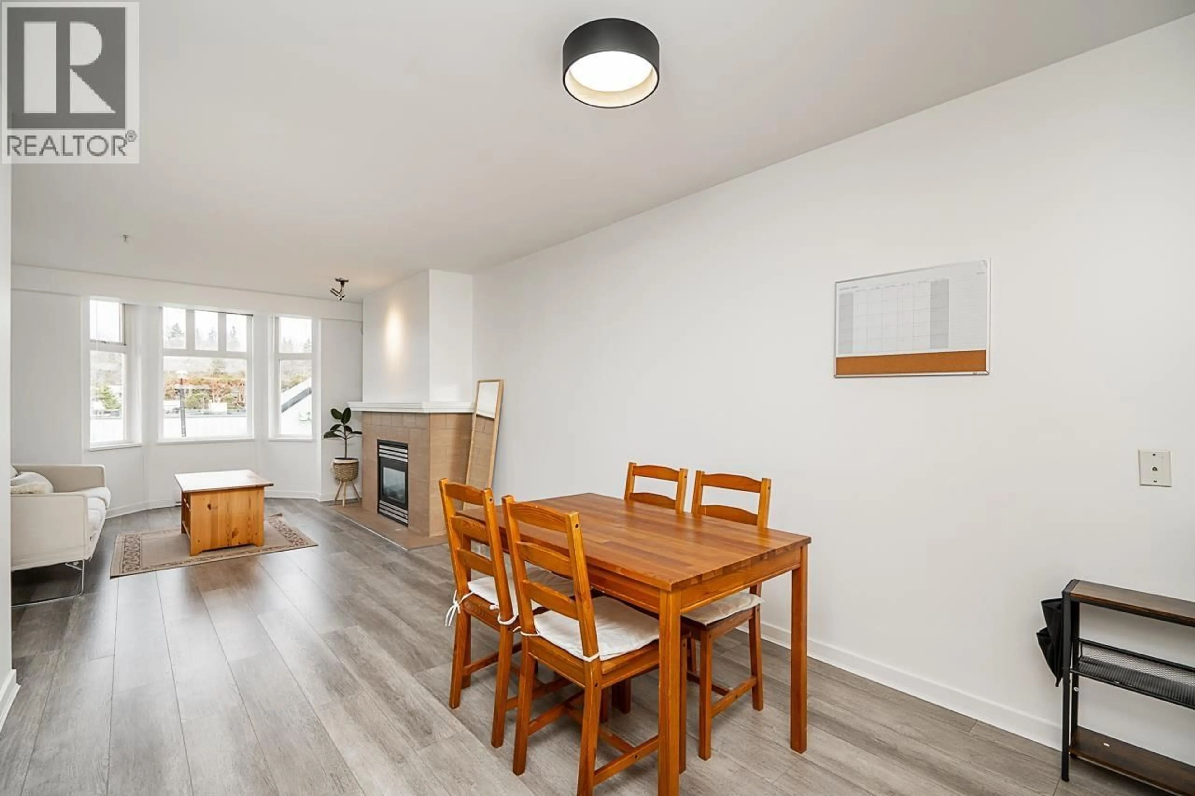 Dining room, wood/laminate floor for 306 - 3580 41ST AVENUE, Vancouver British Columbia V6N3E6