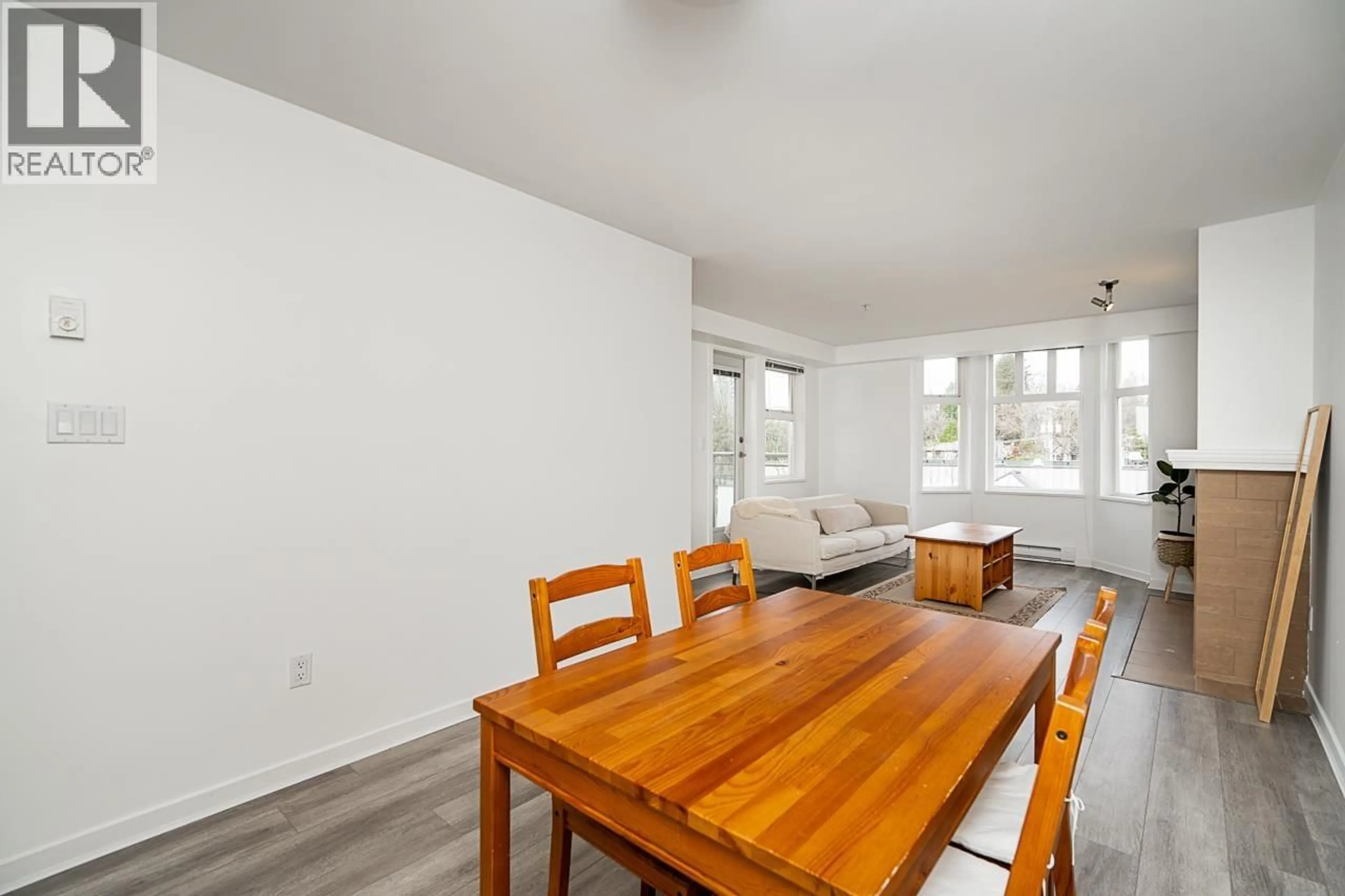 Dining room, wood/laminate floor for 306 - 3580 41ST AVENUE, Vancouver British Columbia V6N3E6