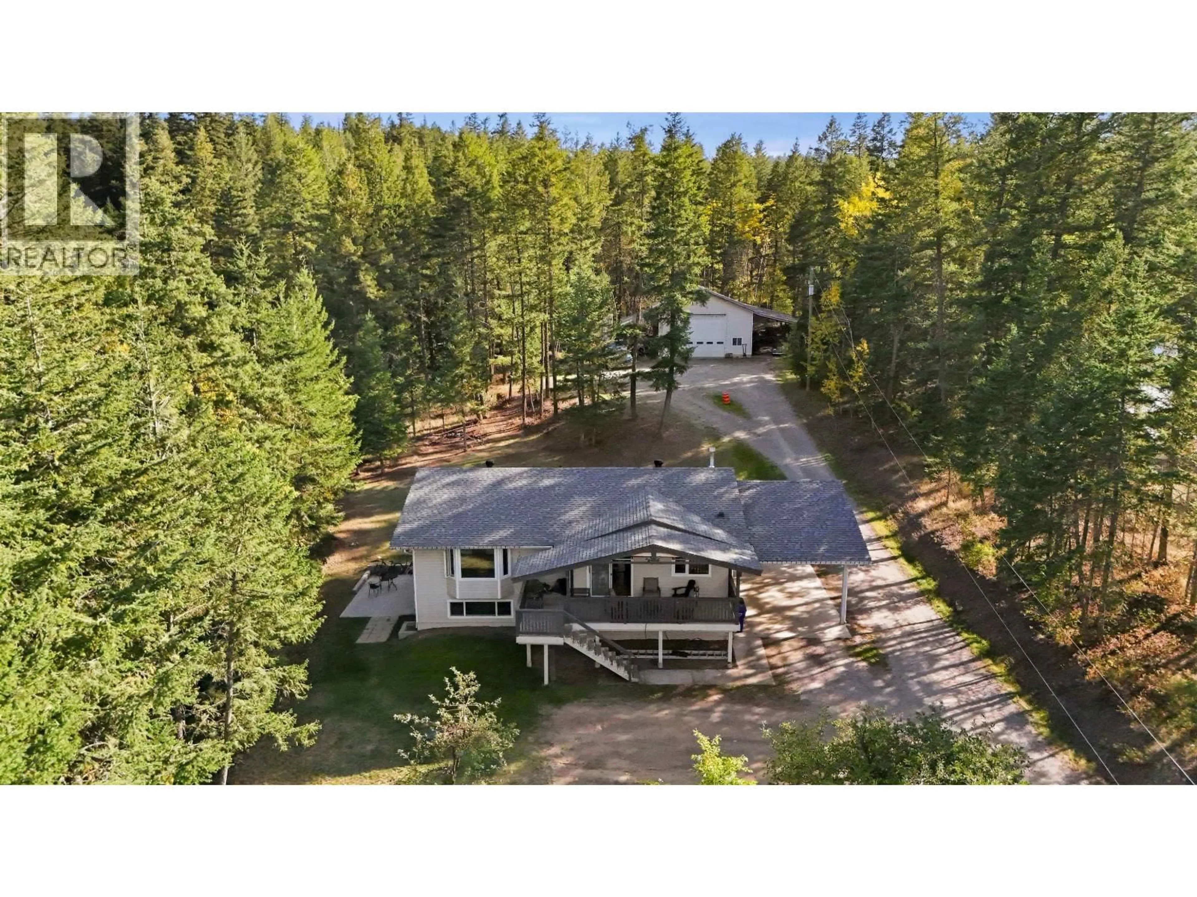 A pic from outside/outdoor area/front of a property/back of a property/a pic from drone, forest/trees view for 523 TAMARACK ROAD, Williams Lake British Columbia V2G4J2