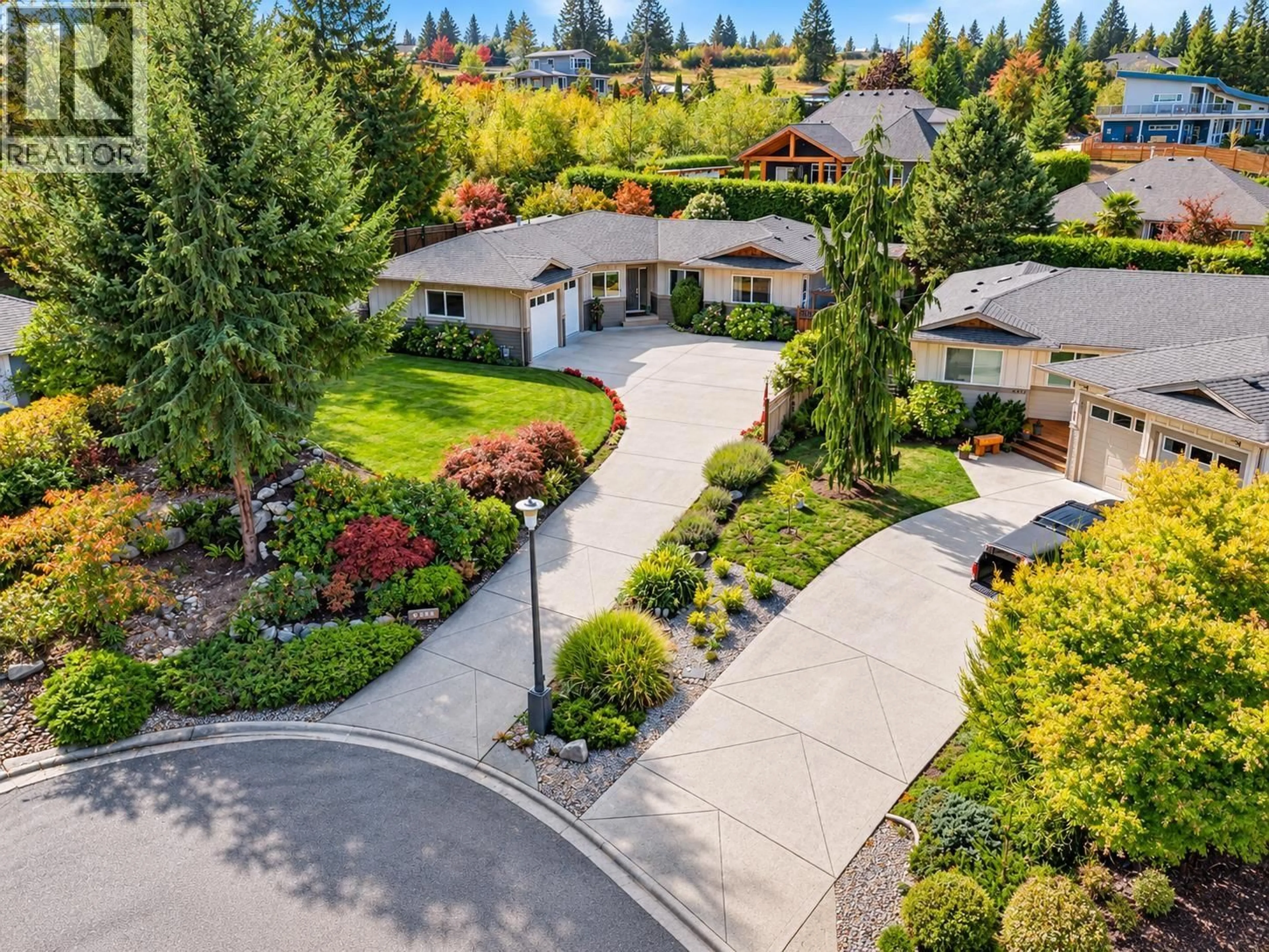 A pic from outside/outdoor area/front of a property/back of a property/a pic from drone, unknown for 6388 PIPER PLACE, Sechelt British Columbia V7Z0L1