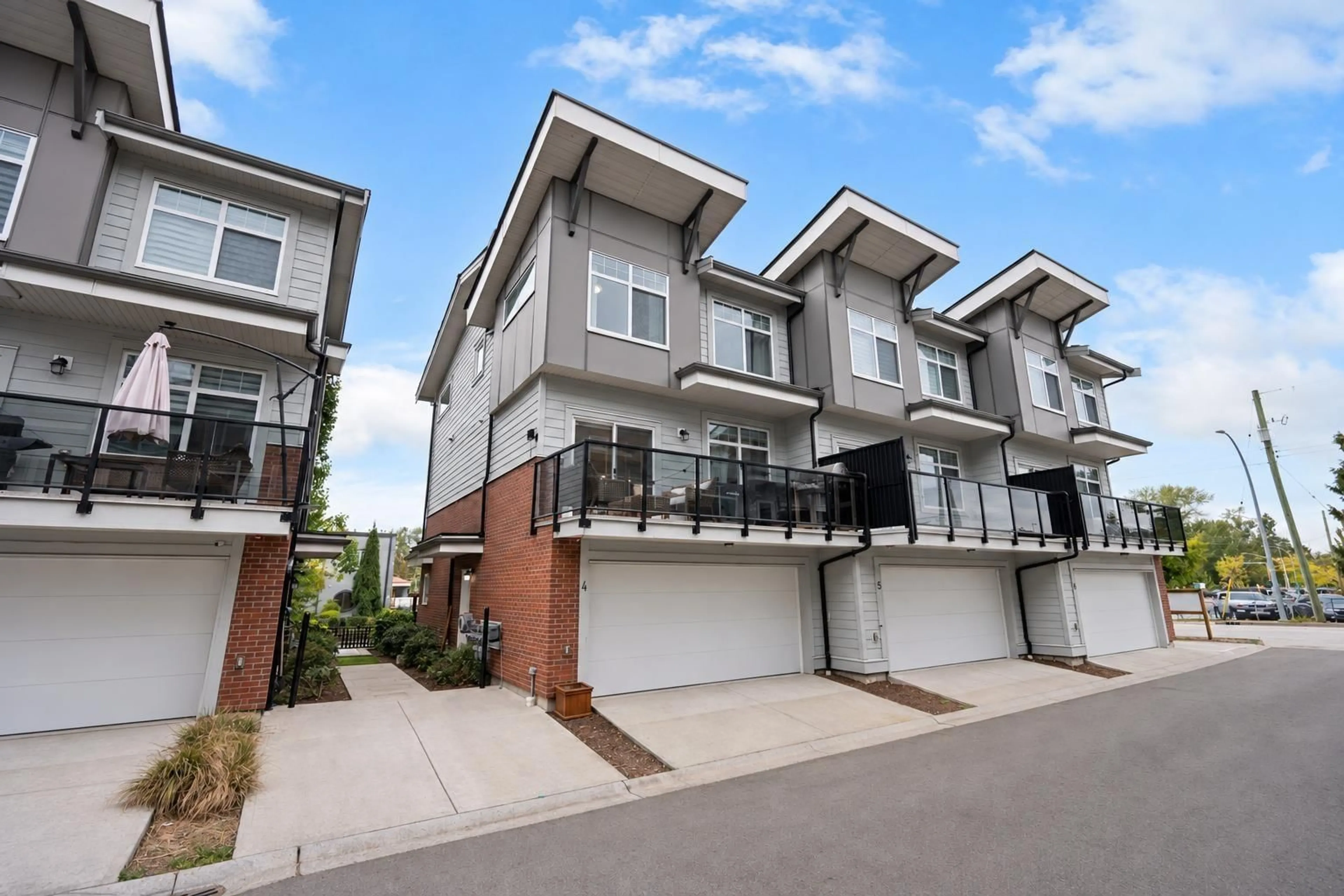 A pic from outside/outdoor area/front of a property/back of a property/a pic from drone, street for 4 - 4771 224 STREET, Langley British Columbia V3A3N5