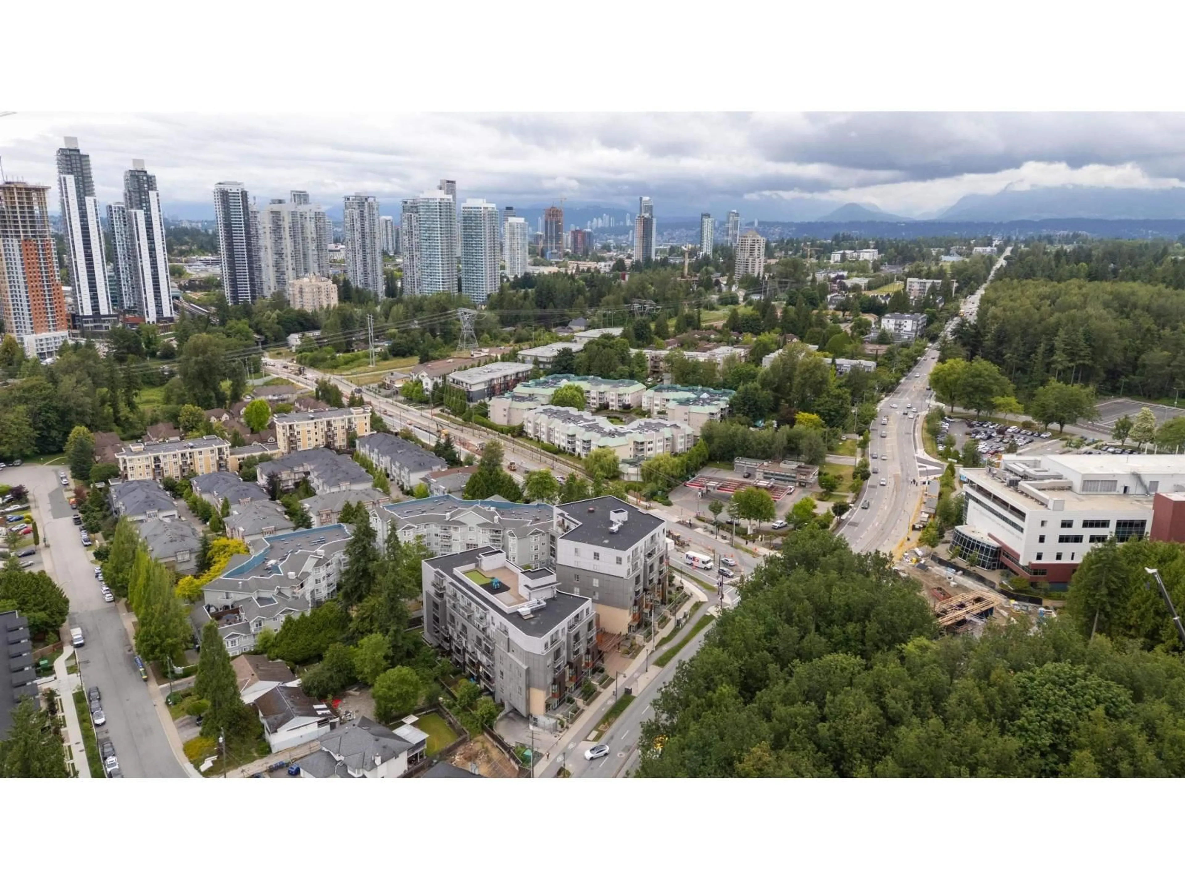 A pic from outside/outdoor area/front of a property/back of a property/a pic from drone, city buildings view from balcony for 201 - 13883 LAUREL DRIVE, Surrey British Columbia V3T1A8