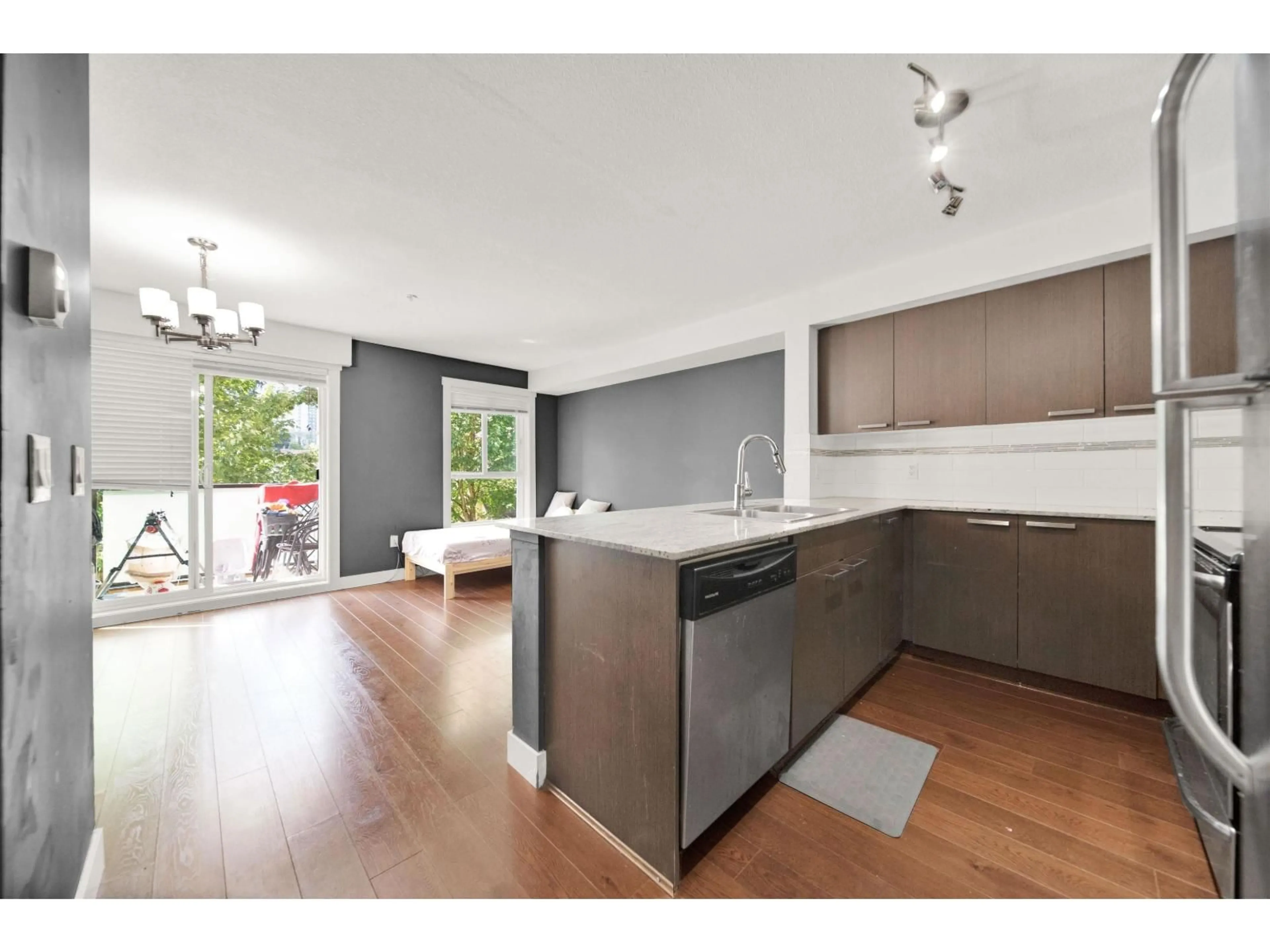 Open concept kitchen, unknown for 201 - 13883 LAUREL DRIVE, Surrey British Columbia V3T1A8