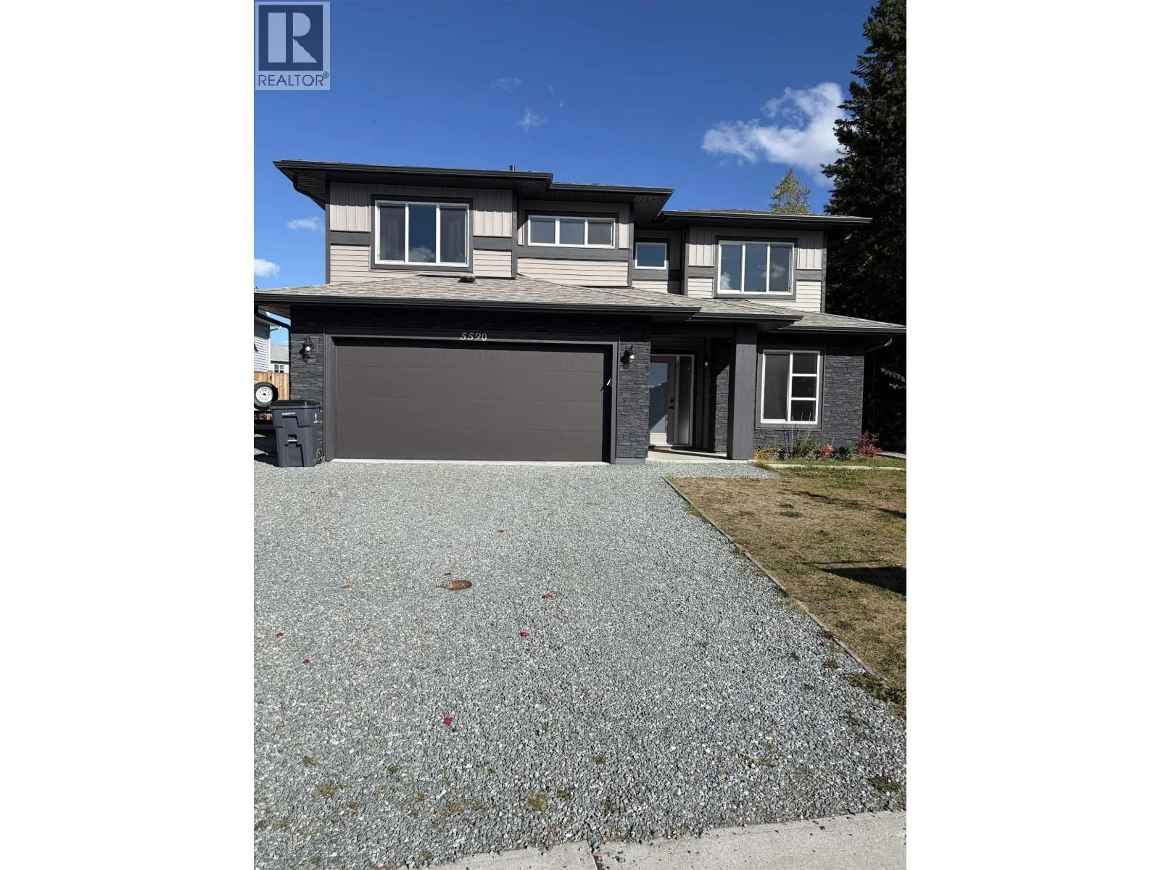 Home with vinyl exterior material, street for 5590 WOODVALEY DRIVE, Prince George British Columbia V2K5A6