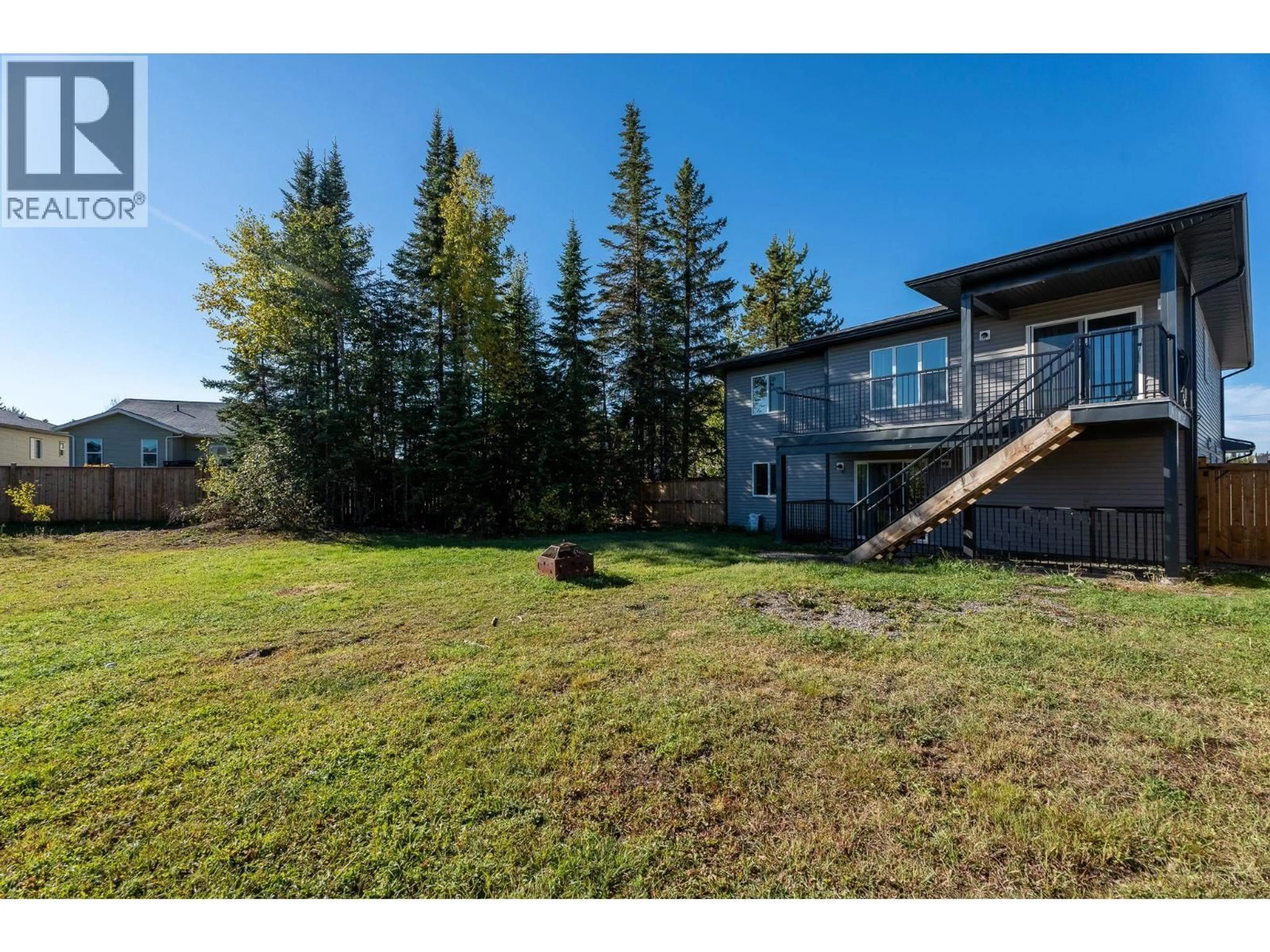 A pic from outside/outdoor area/front of a property/back of a property/a pic from drone, mountain view for 5590 WOODVALEY DRIVE, Prince George British Columbia V2K5A6