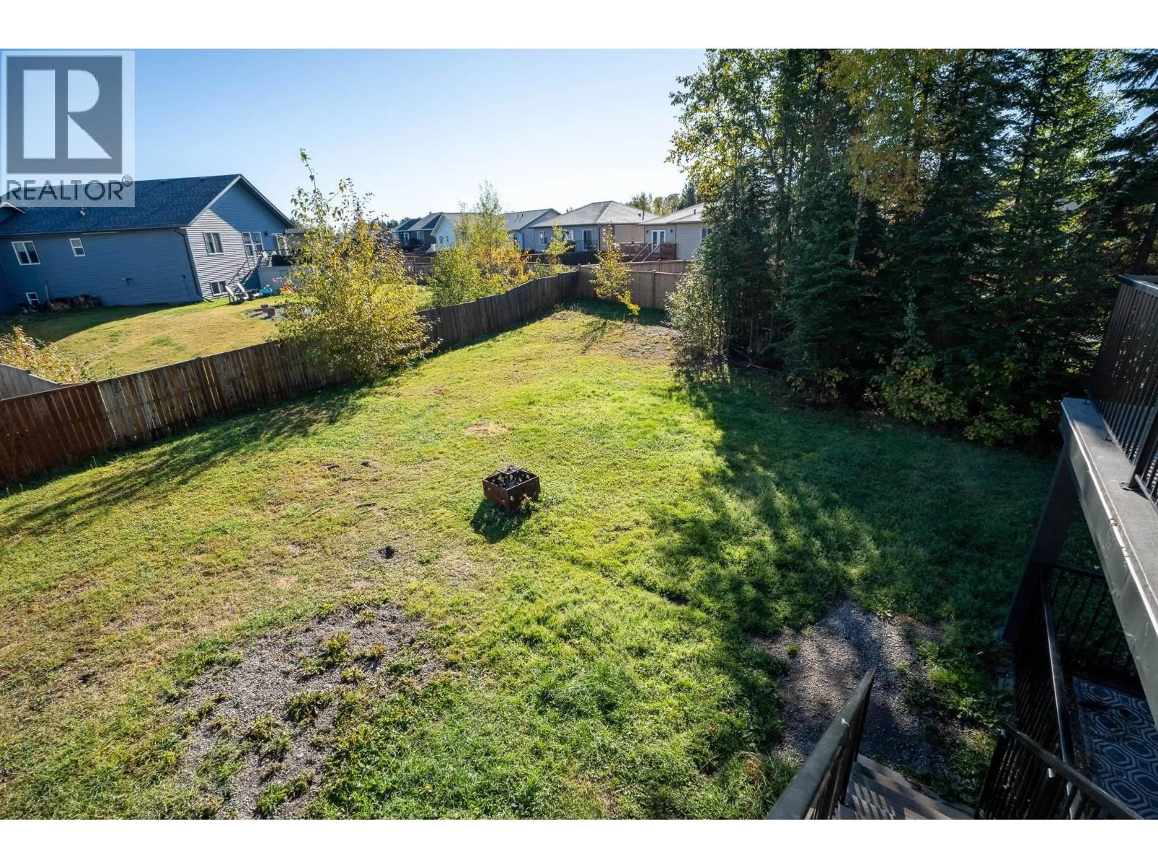A pic from outside/outdoor area/front of a property/back of a property/a pic from drone, unknown for 5590 WOODVALEY DRIVE, Prince George British Columbia V2K5A6