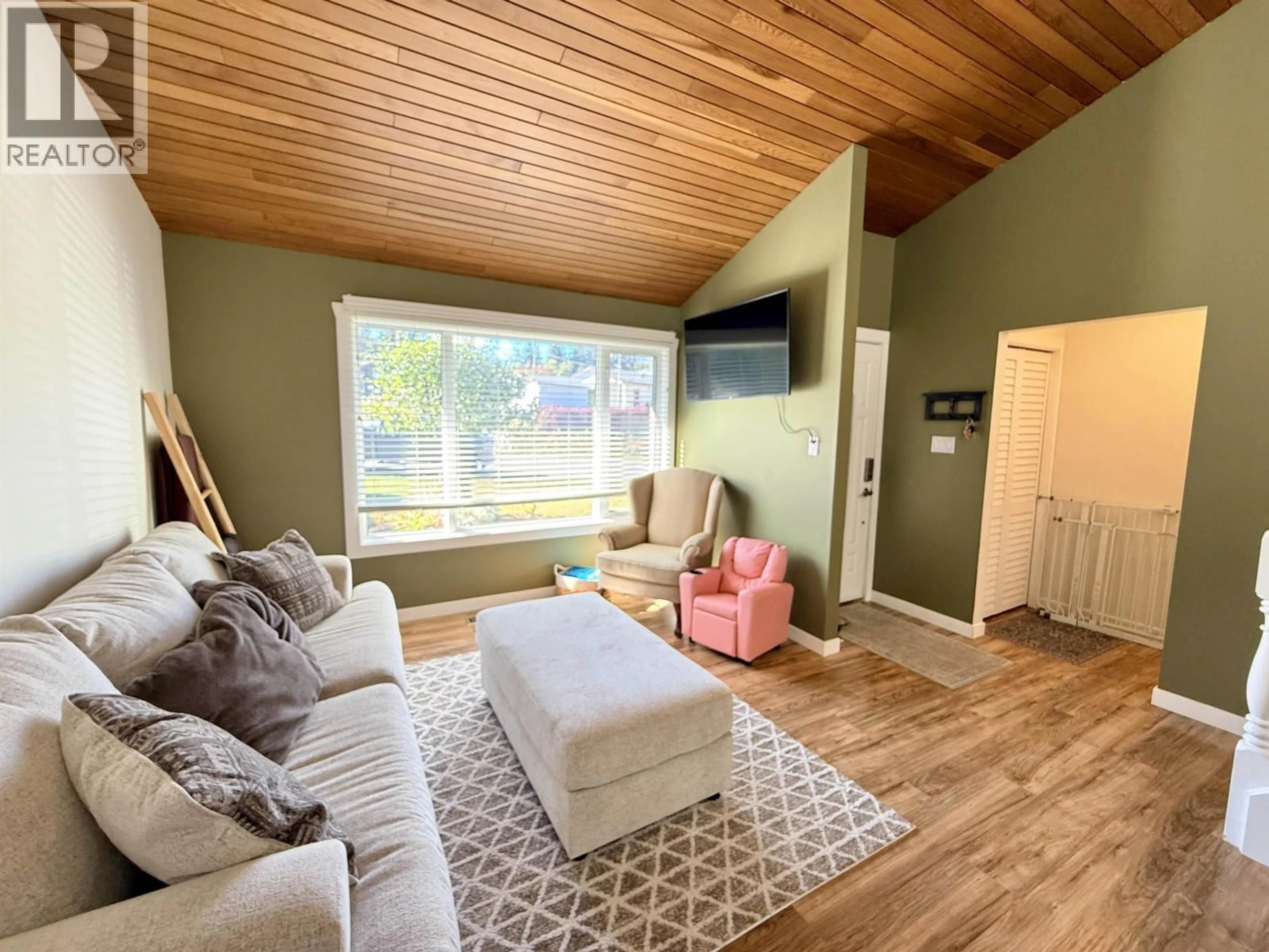 Living room with furniture, wood/laminate floor for 2838 INGALA DRIVE, Prince George British Columbia V2K3Z8