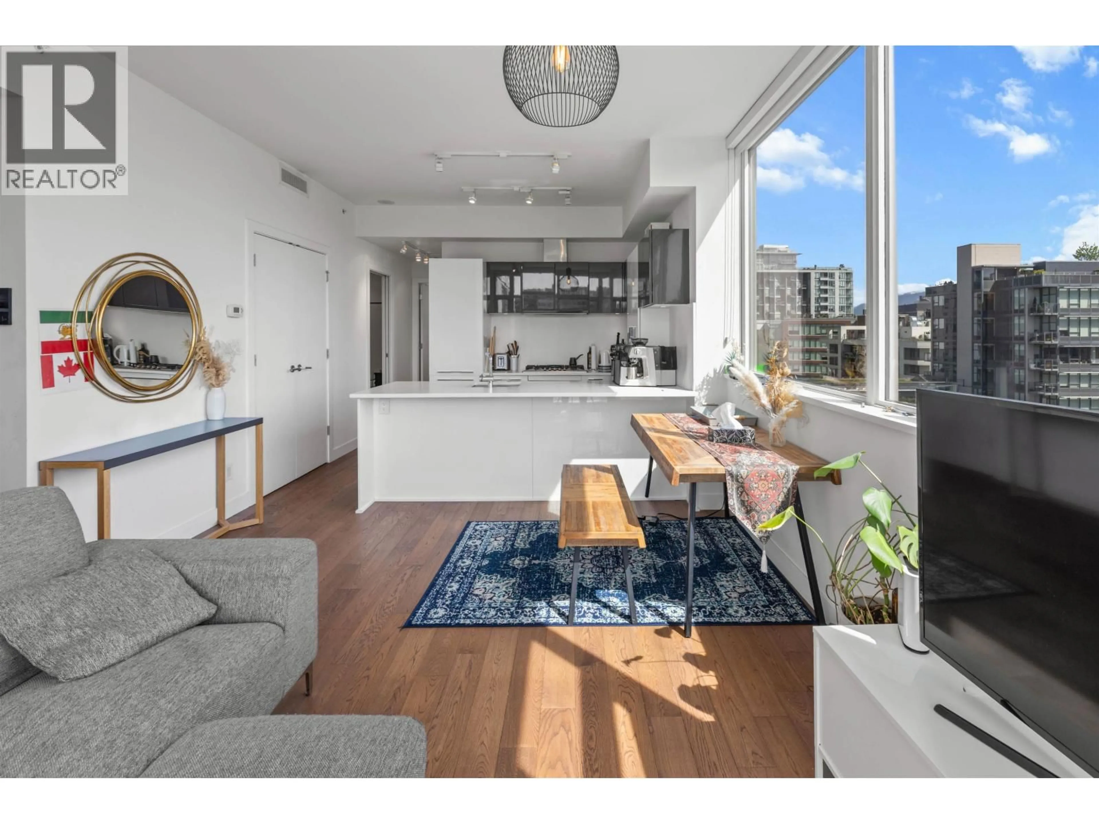 Open concept kitchen, wood/laminate floor for 1001 - 108 1ST AVENUE, Vancouver British Columbia V5T0E4