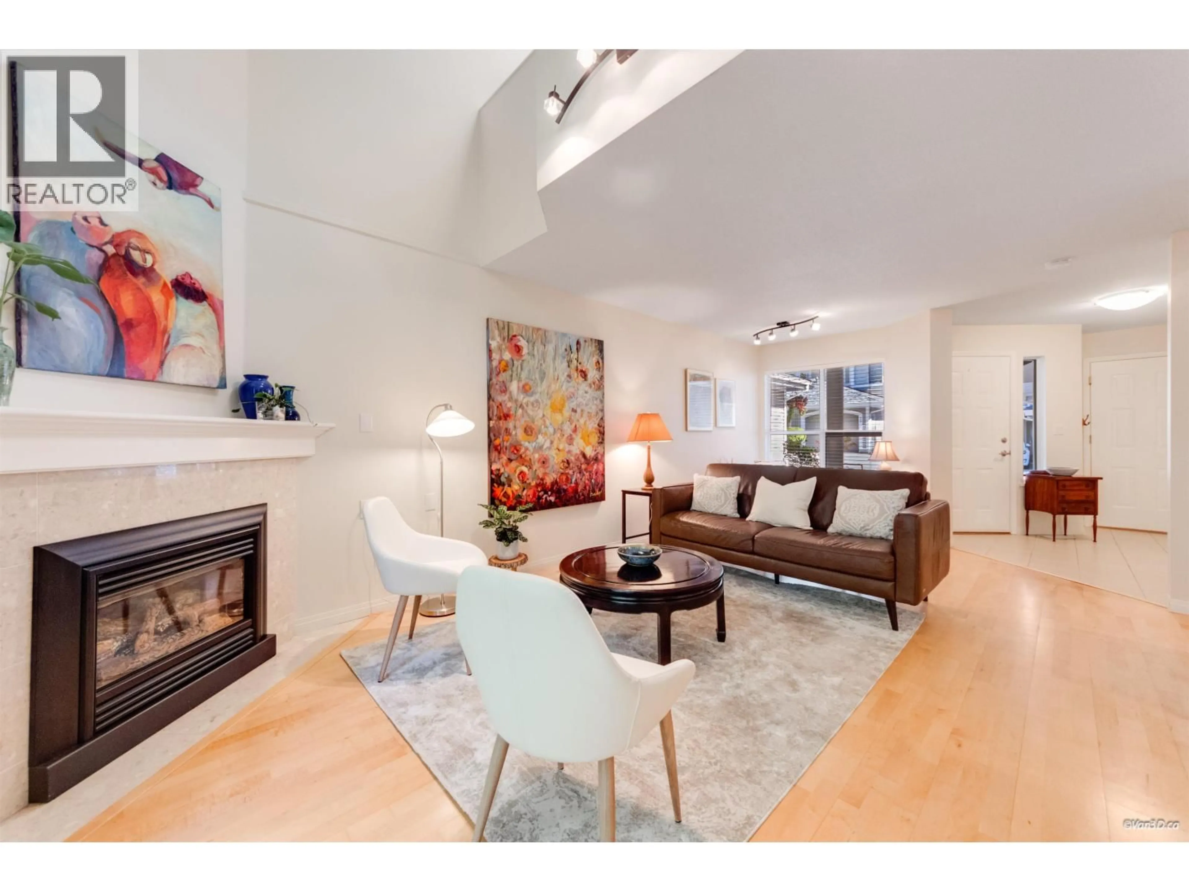 Living room with furniture, wood/laminate floor for 49 - 650 ROCHE POINT DRIVE, North Vancouver British Columbia V7H2Z5