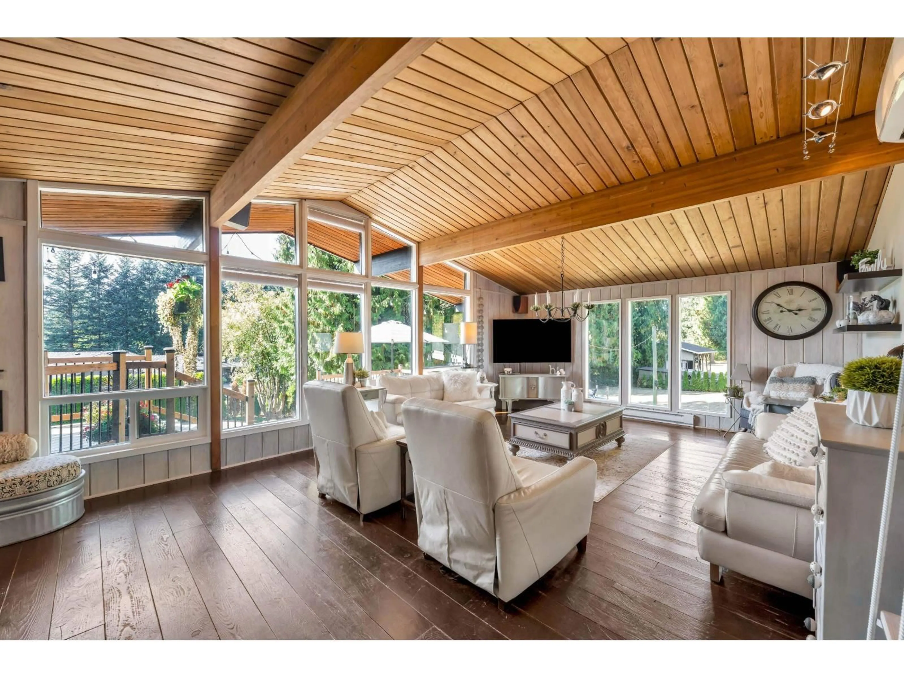 Living room with furniture, wood/laminate floor for 24071 63 AVENUE, Langley British Columbia V2Y2G3