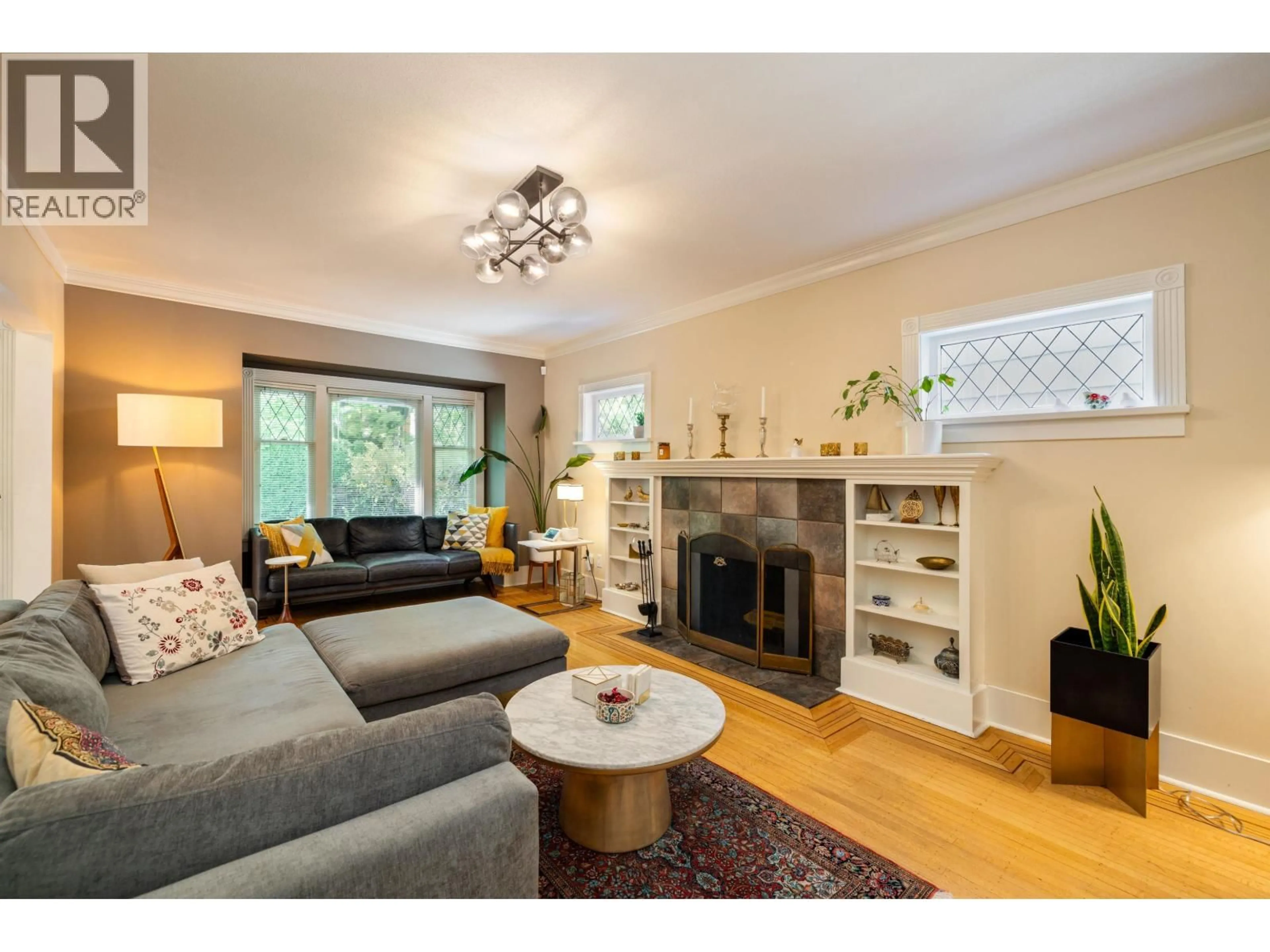 Living room with furniture, wood/laminate floor for 4343 11TH AVENUE, Vancouver British Columbia V6R2L9