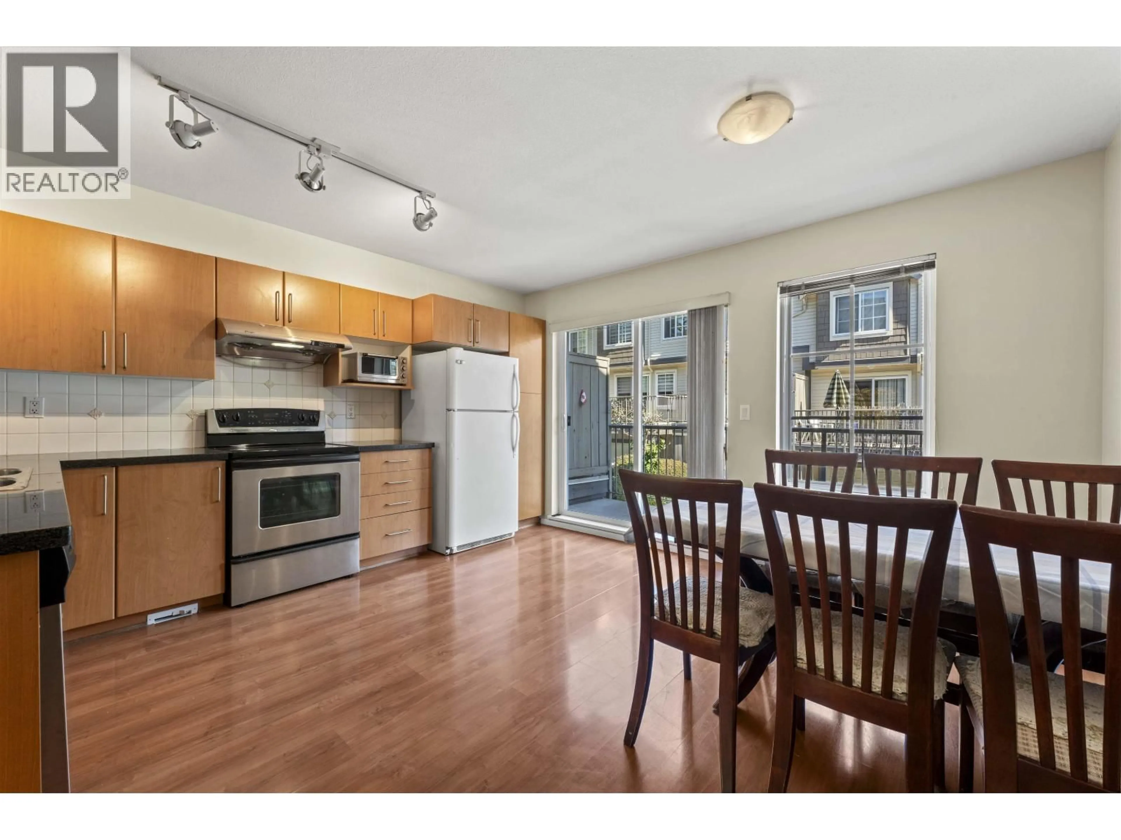 Open concept kitchen, wood/laminate floor for 31 - 3368 MORREY COURT, Burnaby British Columbia V3J7Y5