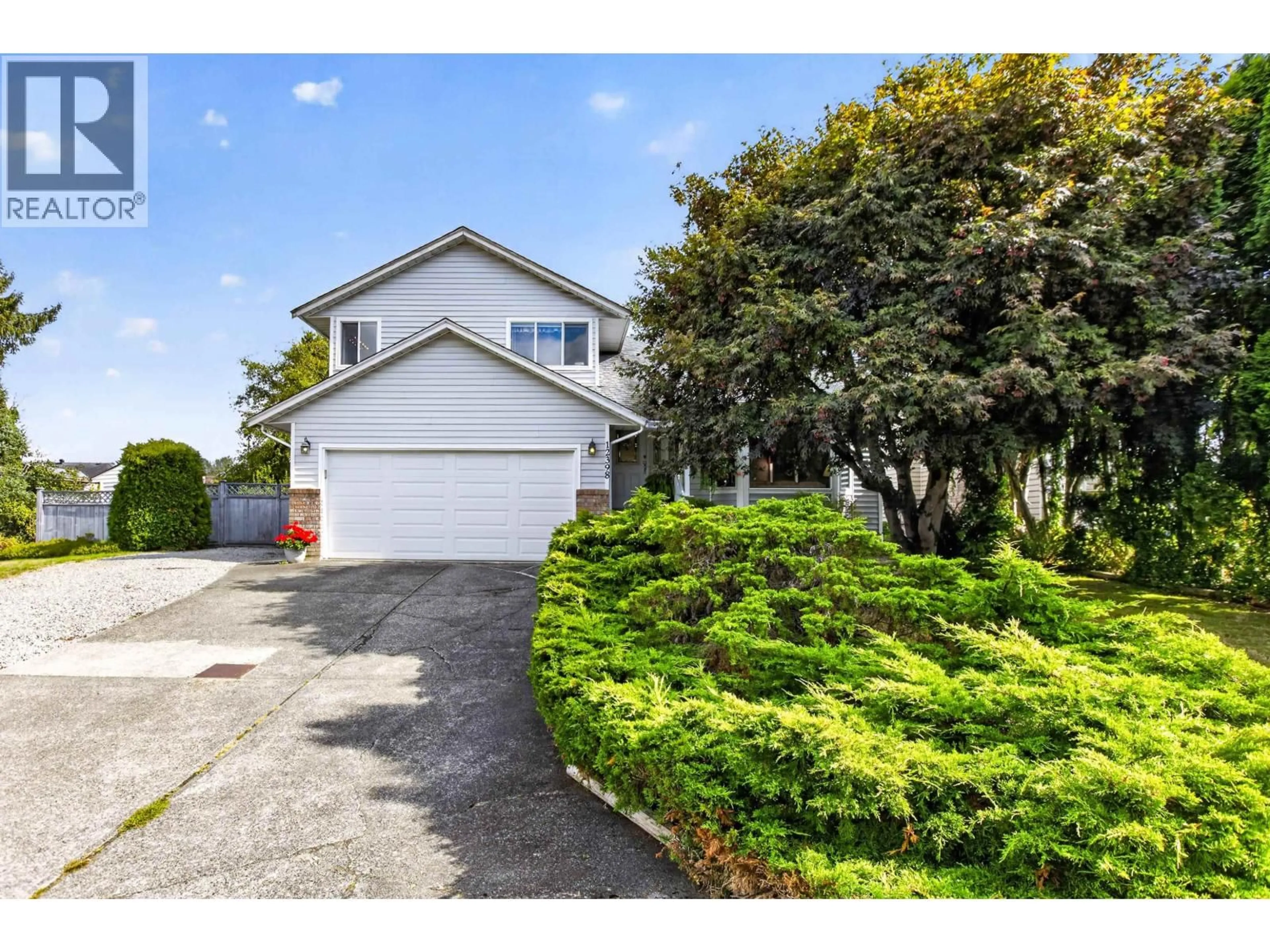 A pic from outside/outdoor area/front of a property/back of a property/a pic from drone, street for 12398 233 STREET, Maple Ridge British Columbia V2X9X6