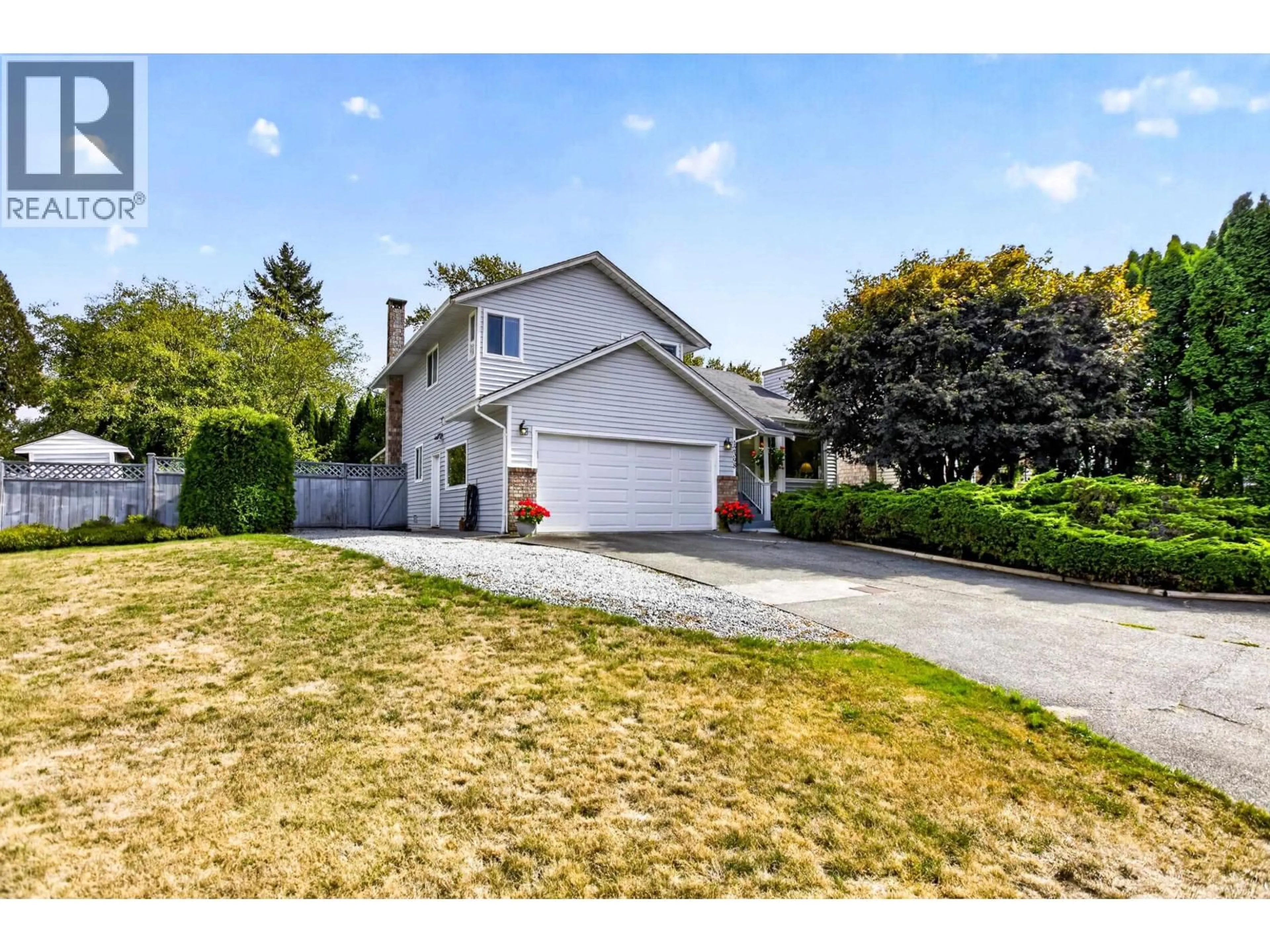A pic from outside/outdoor area/front of a property/back of a property/a pic from drone, street for 12398 233 STREET, Maple Ridge British Columbia V2X9X6