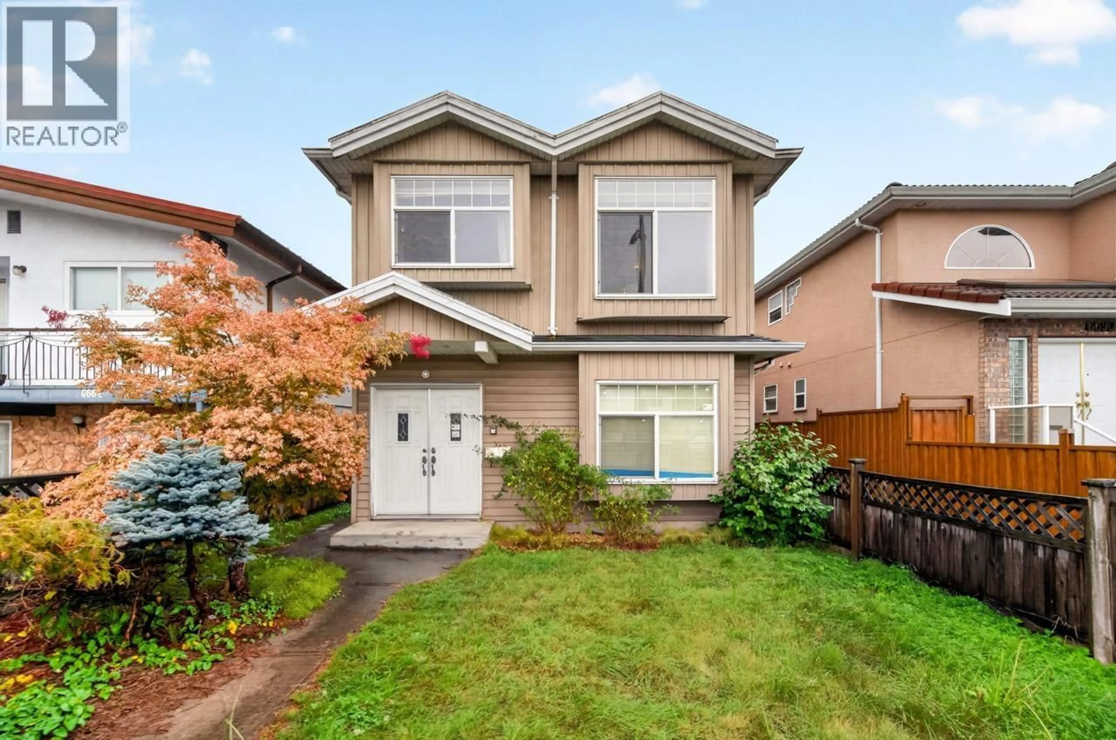 Home with vinyl exterior material, street for 6676 VICTORIA DRIVE, Vancouver British Columbia V5P3Y1