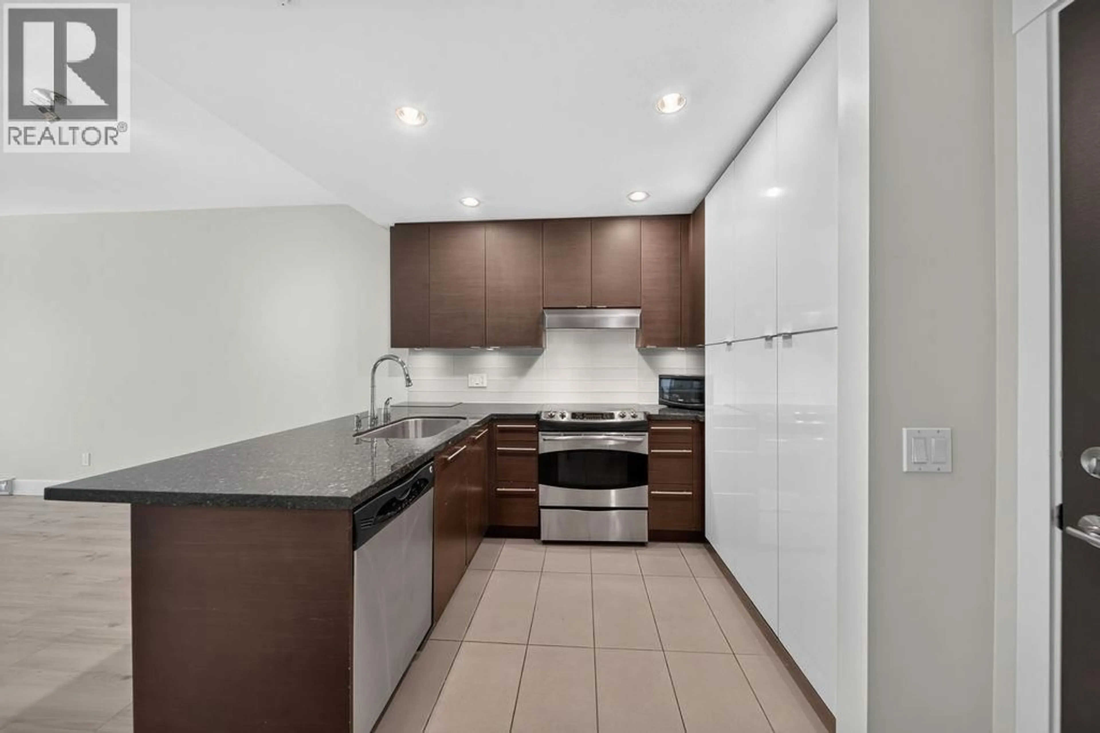 Standard kitchen, ceramic/tile floor for 208 - 3478 WESBROOK MALL, Vancouver British Columbia V6S0B6