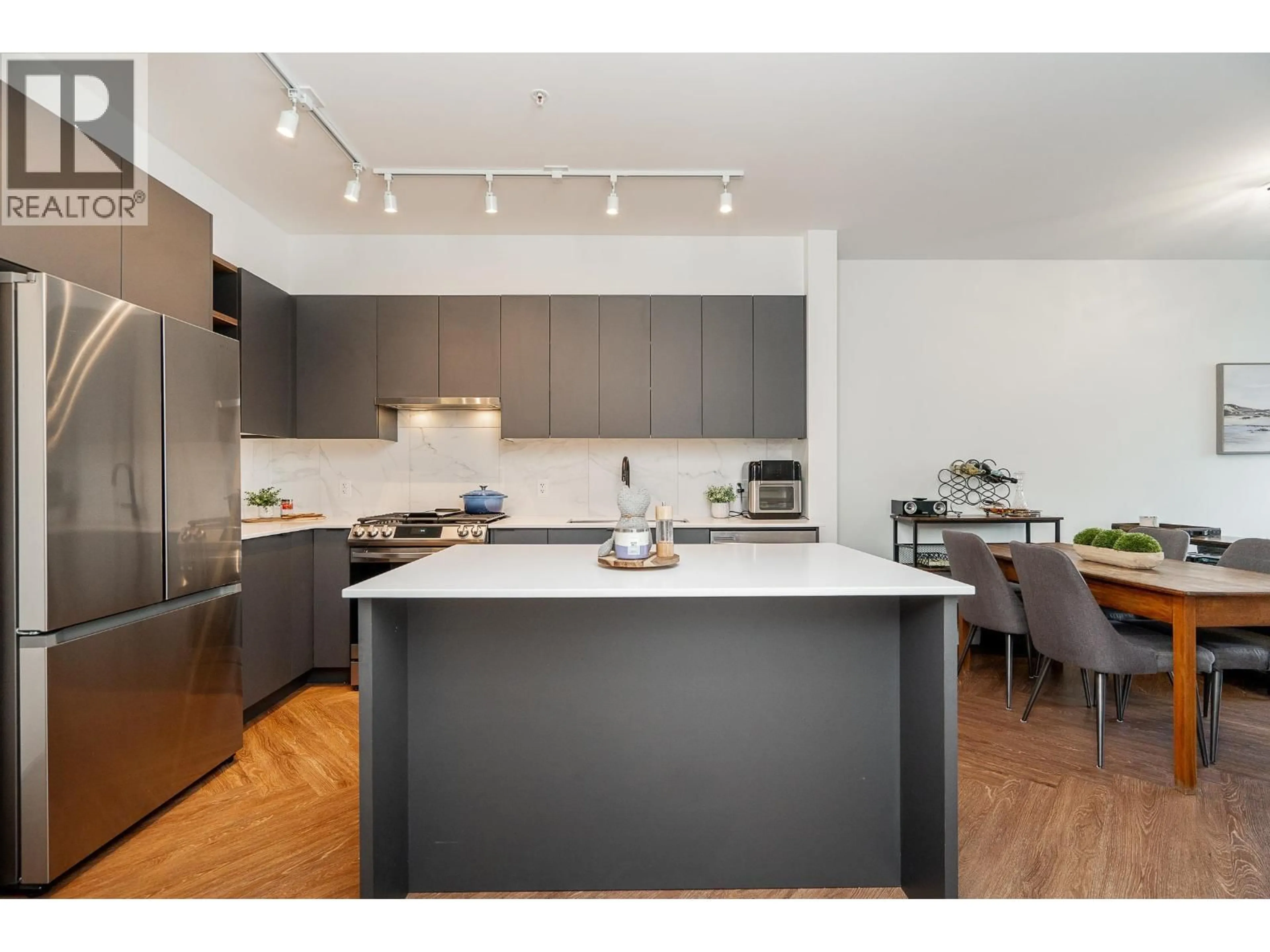 Open concept kitchen, wood/laminate floor for 213 - 3229 ST JOHNS STREET, Port Moody British Columbia V3H0M4