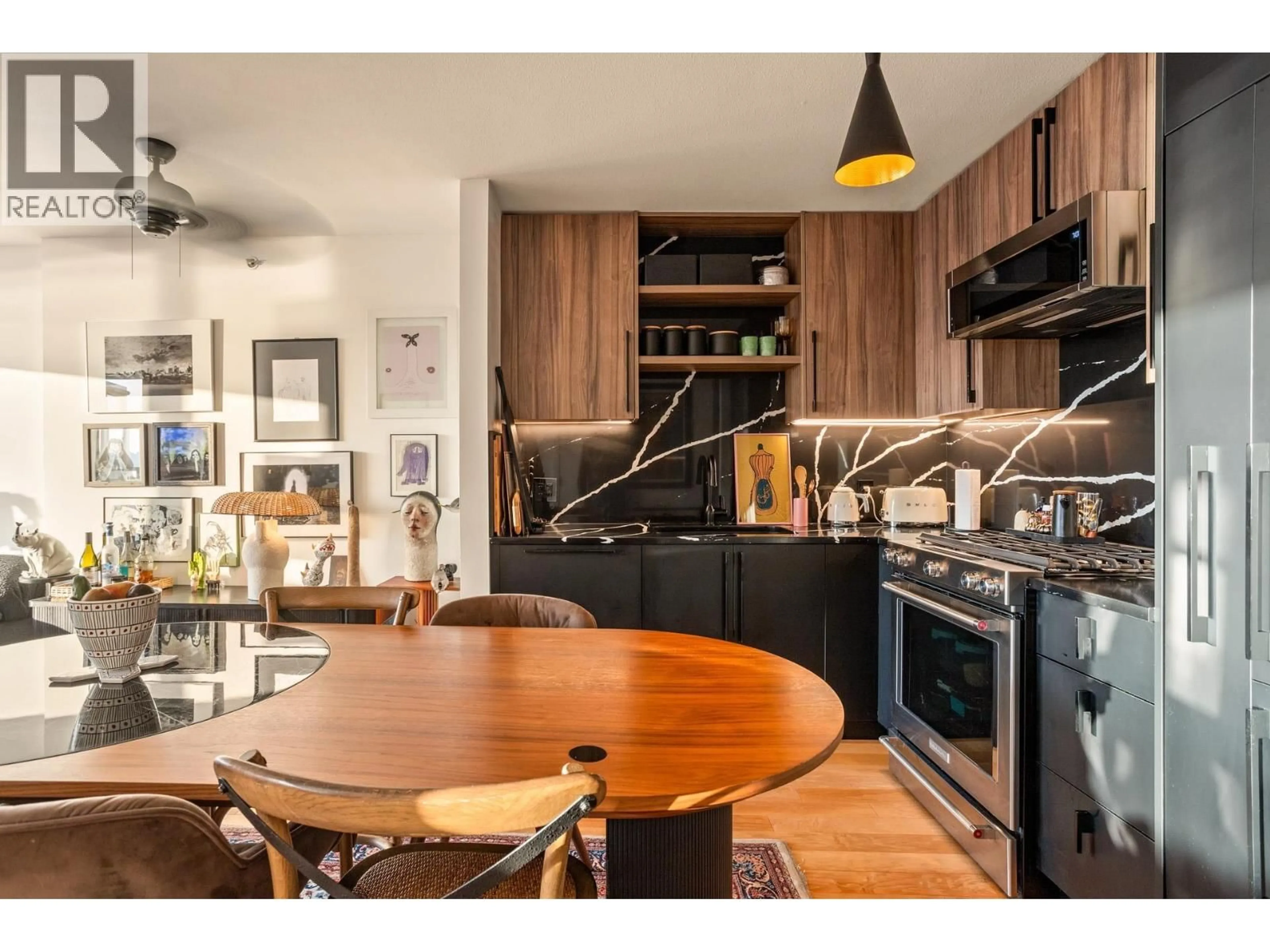 Open concept kitchen, wood/laminate floor for 1505 - 155 1ST STREET, North Vancouver British Columbia V7M3N8
