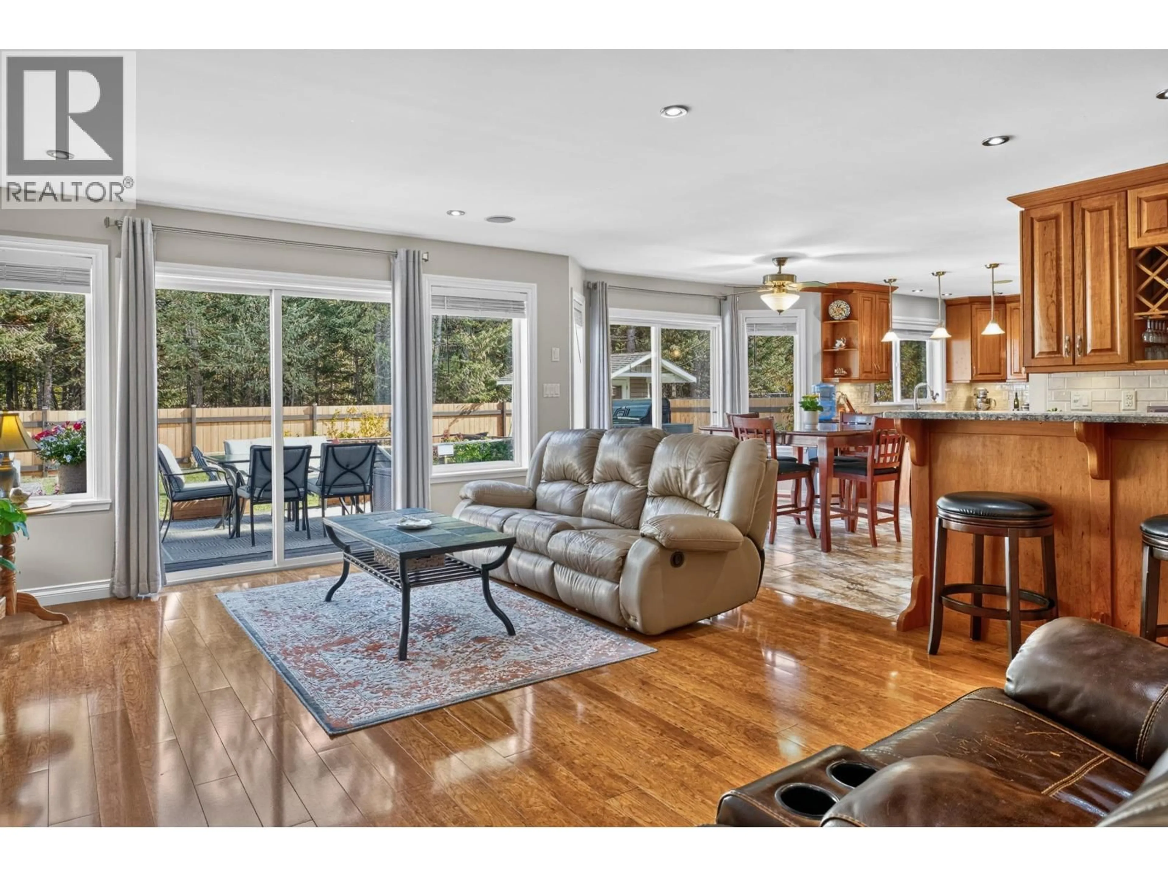 Open concept kitchen, wood/laminate floor for 939 FRASER AVENUE, 100 Mile House British Columbia V0K2E0