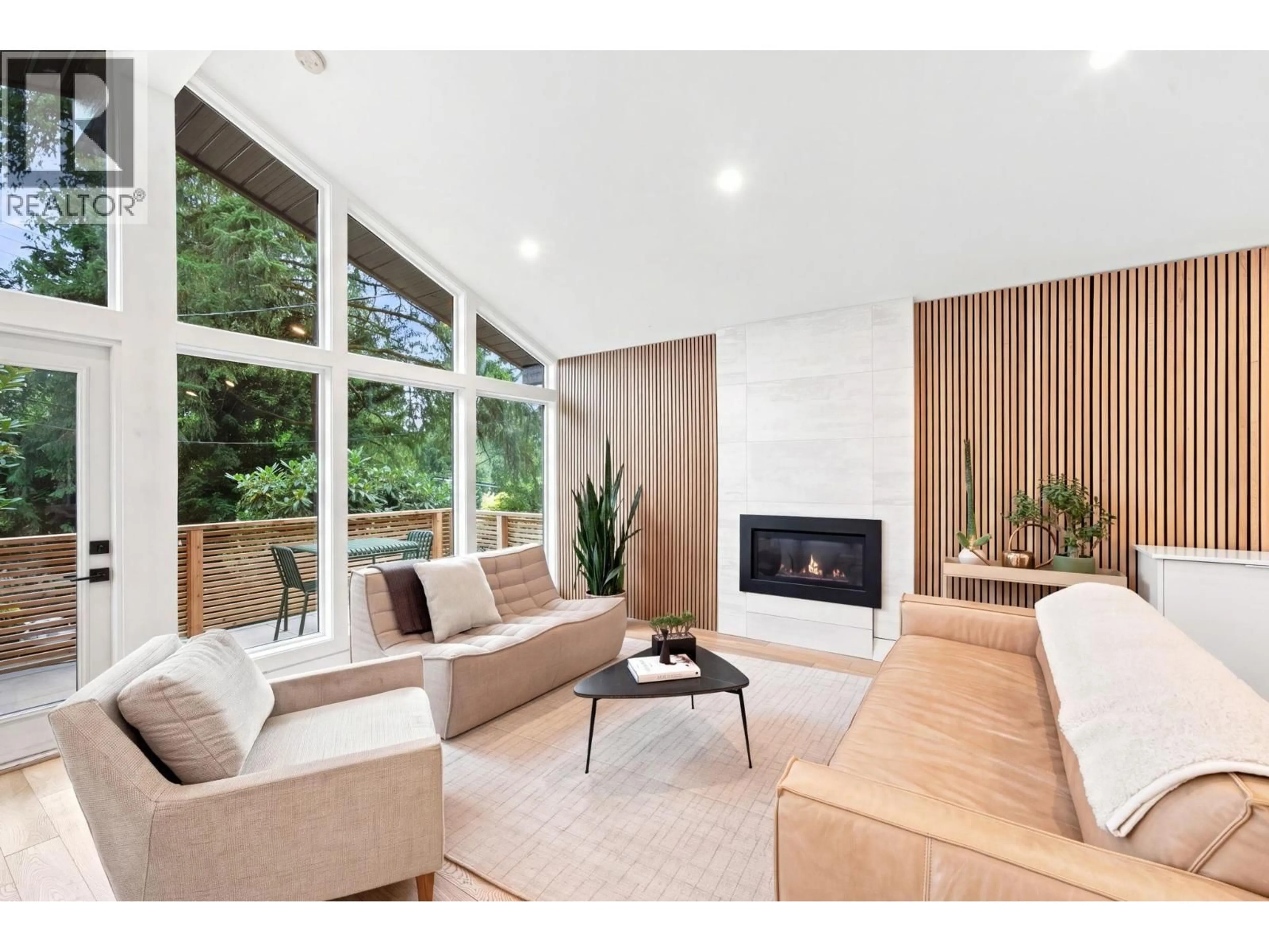 Living room with furniture, wood/laminate floor for 4646 COVE CLIFF ROAD, North Vancouver British Columbia V7G1H6