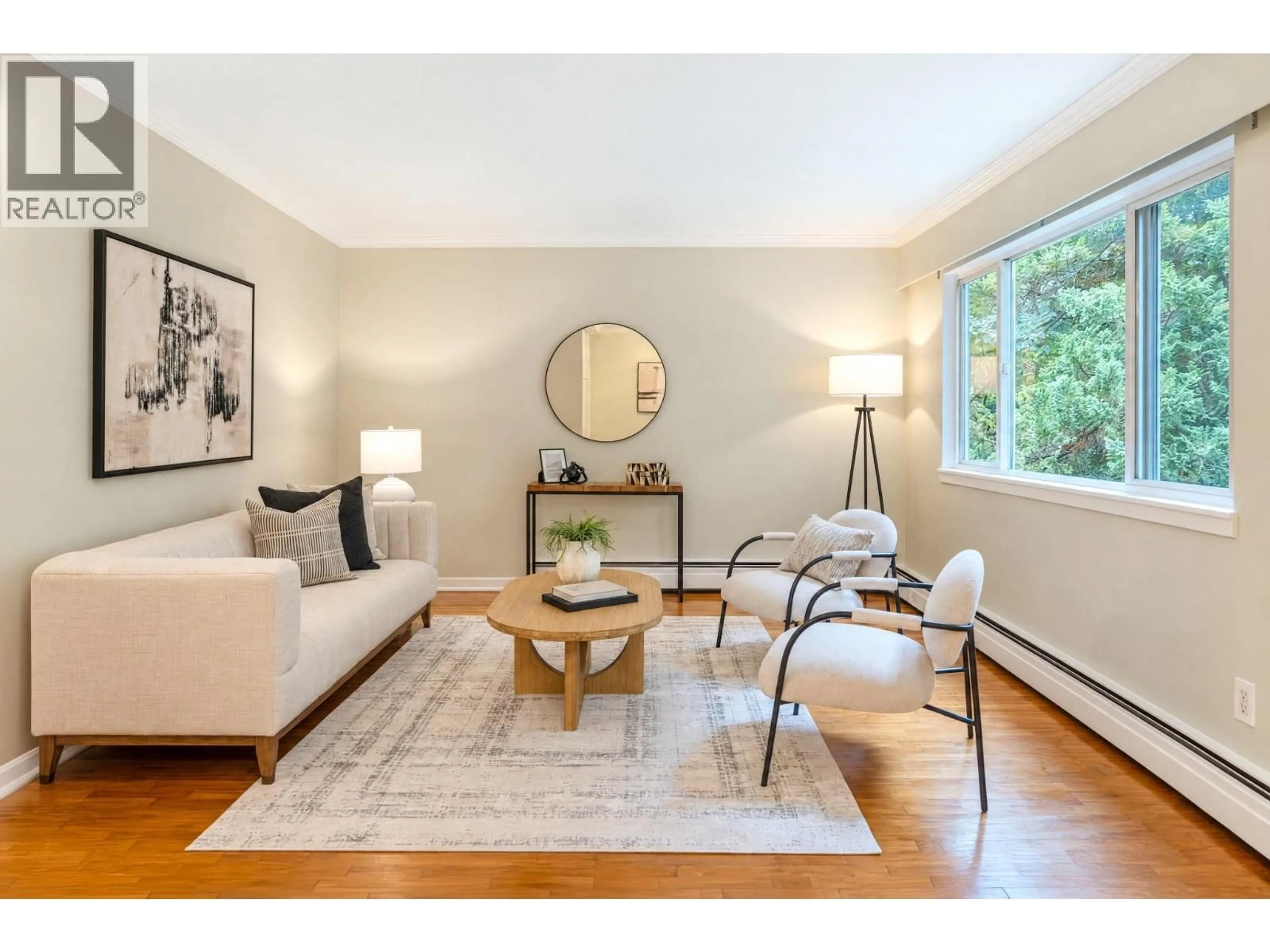 Living room with furniture, unknown for 403 - 555 28TH STREET, North Vancouver British Columbia V7N2J7