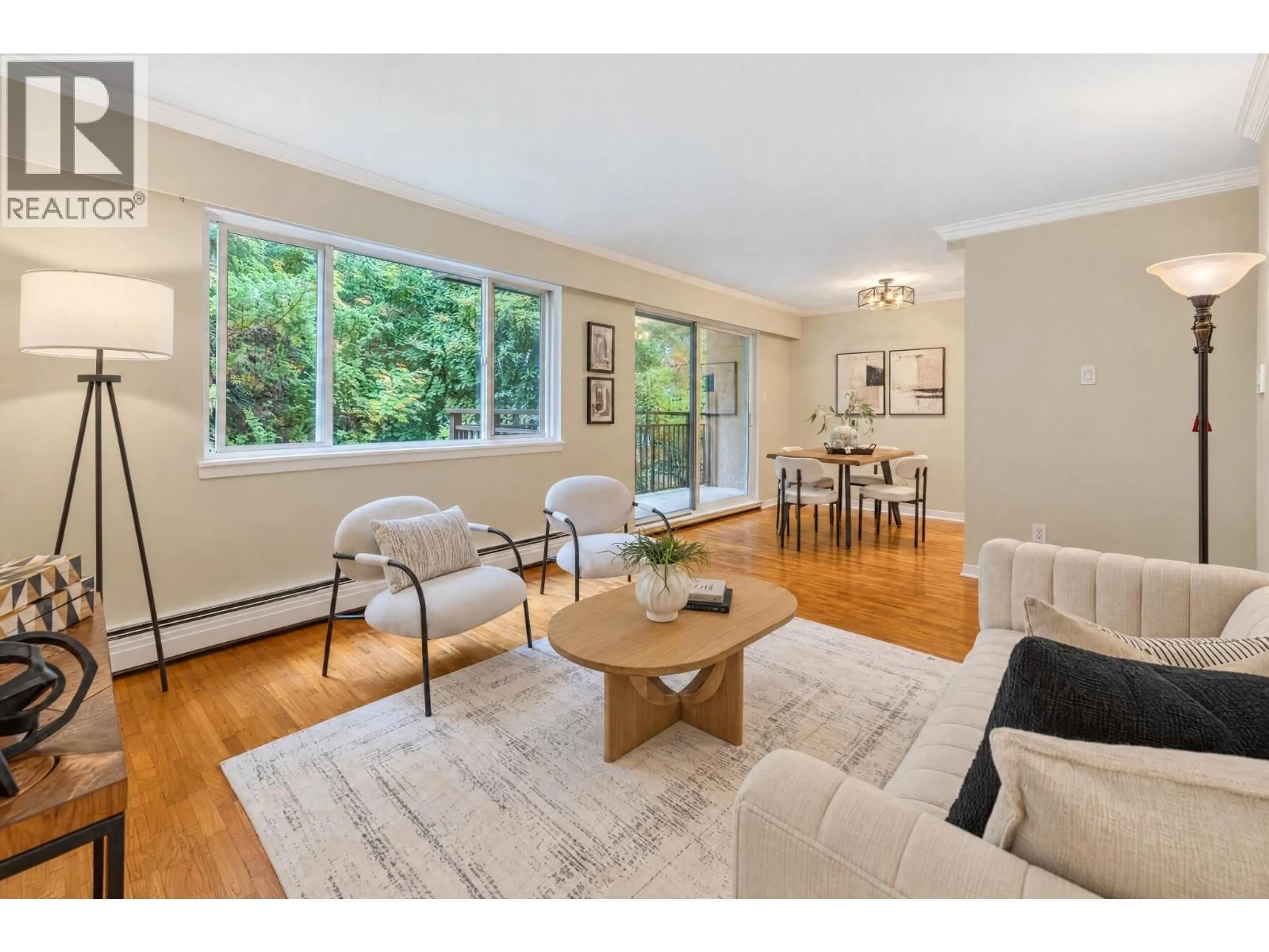 Living room with furniture, wood/laminate floor for 403 - 555 28TH STREET, North Vancouver British Columbia V7N2J7