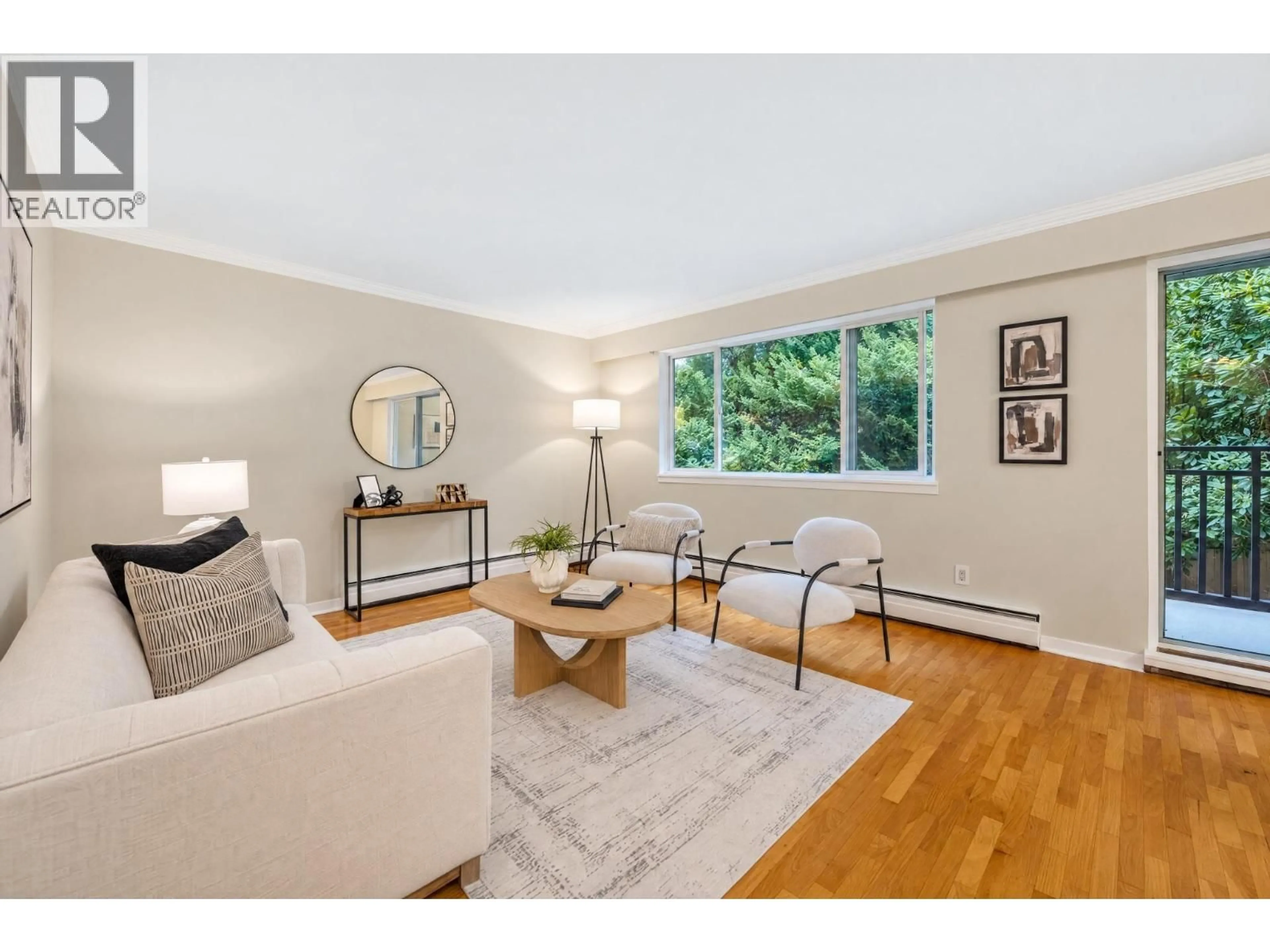 Living room with furniture, wood/laminate floor for 403 - 555 28TH STREET, North Vancouver British Columbia V7N2J7