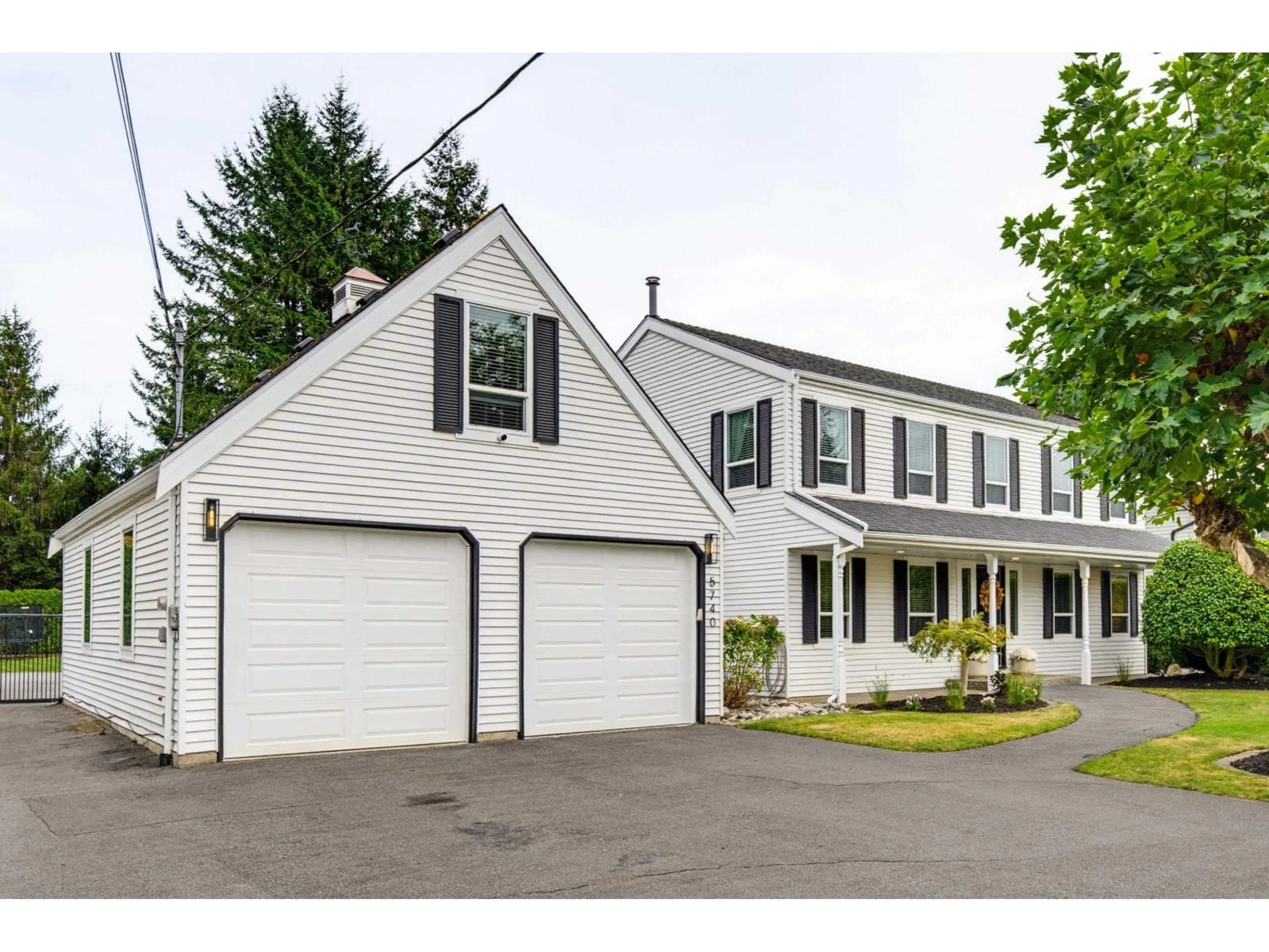 Home with vinyl exterior material, street for 5740 244B STREET, Langley British Columbia V2Z1G8