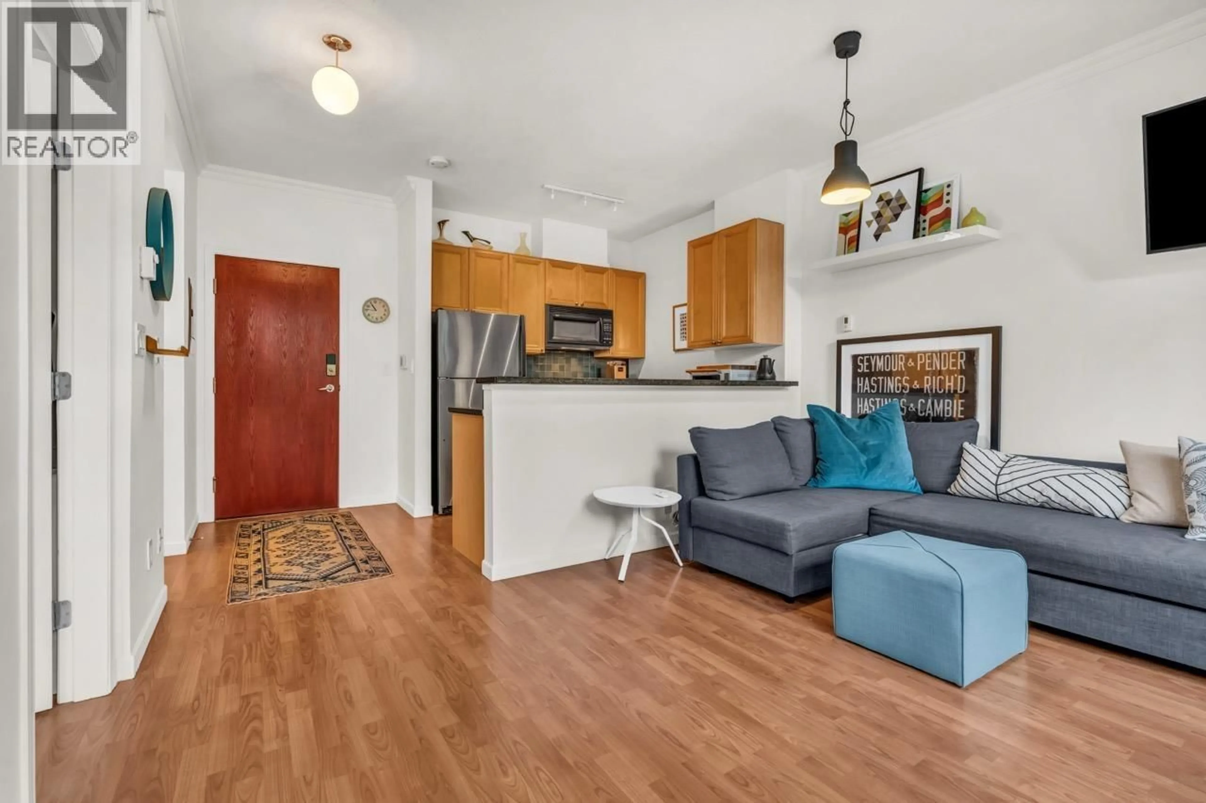 Living room with furniture, wood/laminate floor for 307 - 928 RICHARDS STREET STREET, Vancouver British Columbia V6B6P6