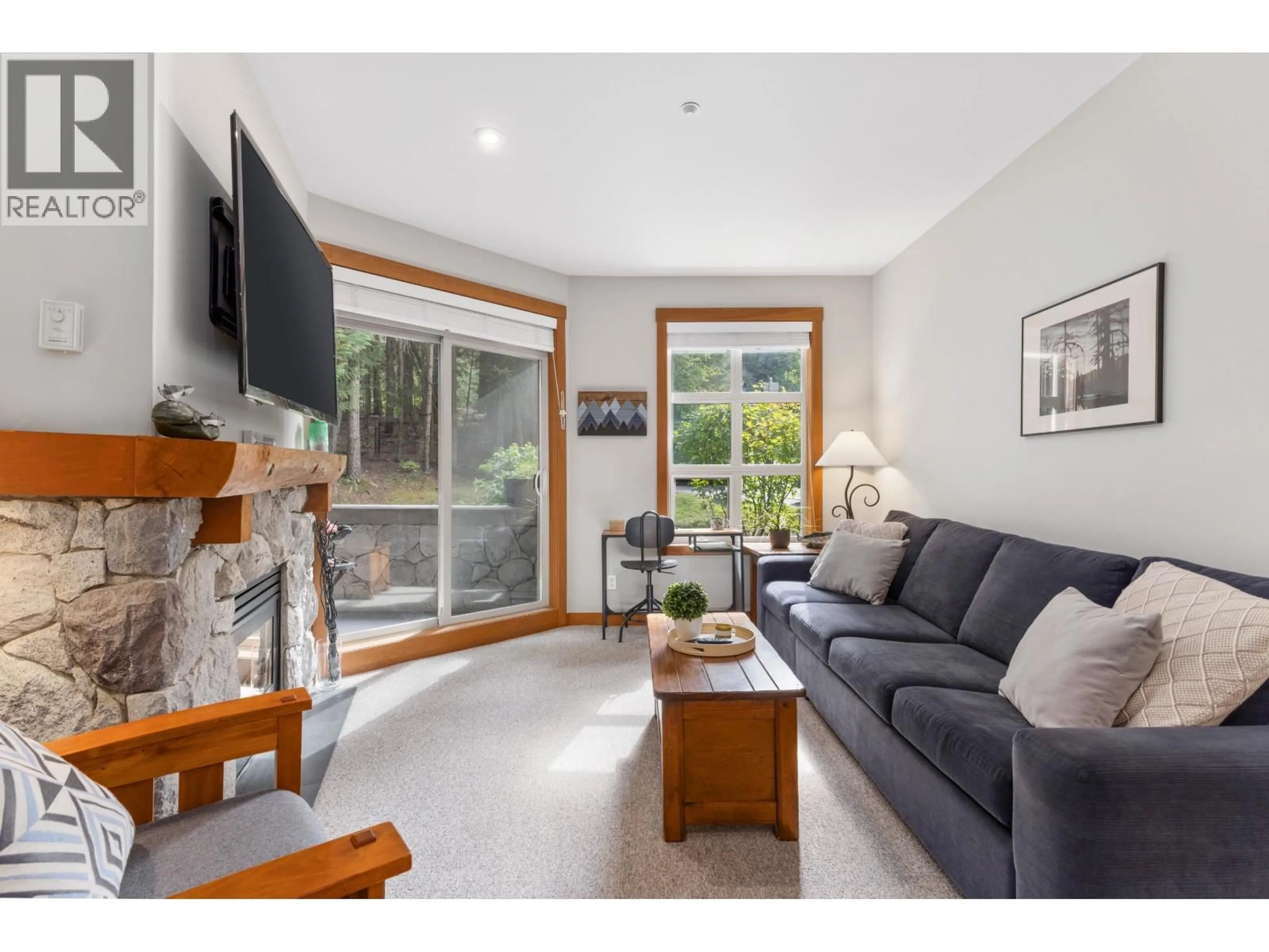 Living room with furniture, wood/laminate floor for 222 - 4660 BLACKCOMB WAY, Whistler British Columbia V0N1B4