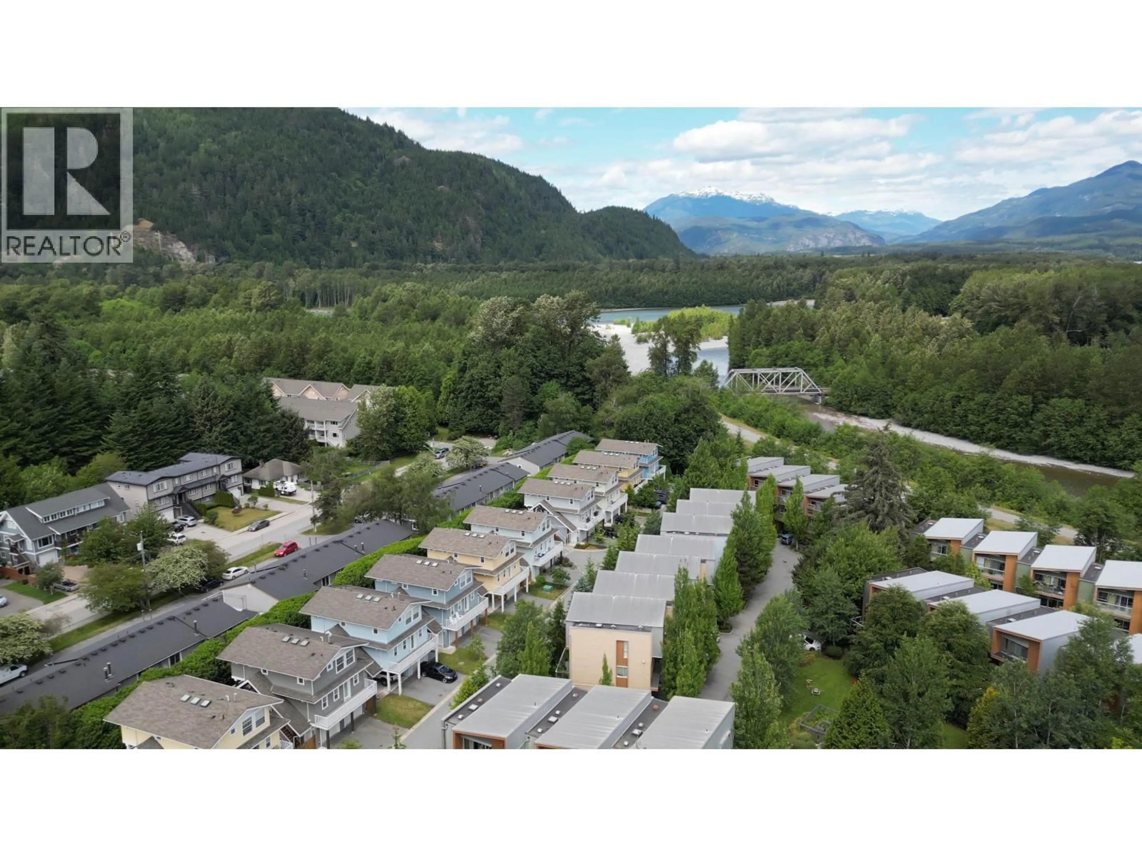 A pic from outside/outdoor area/front of a property/back of a property/a pic from drone, mountain view for 2 - 39885 GOVERNMENT ROAD, Squamish British Columbia V8B0Z2