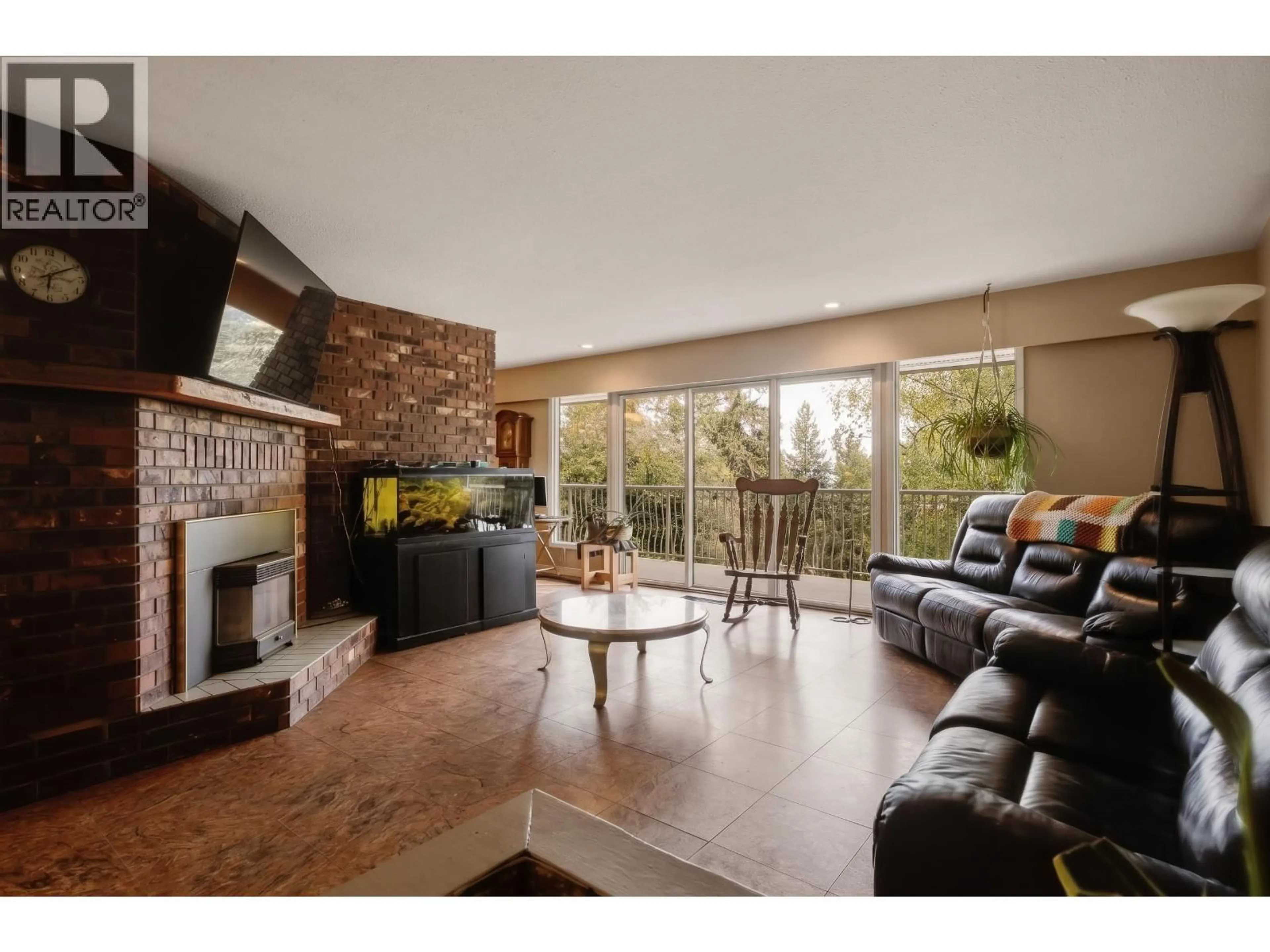 Living room with furniture, wood/laminate floor for 759 WINGER ROAD, Williams Lake British Columbia V2G5J9