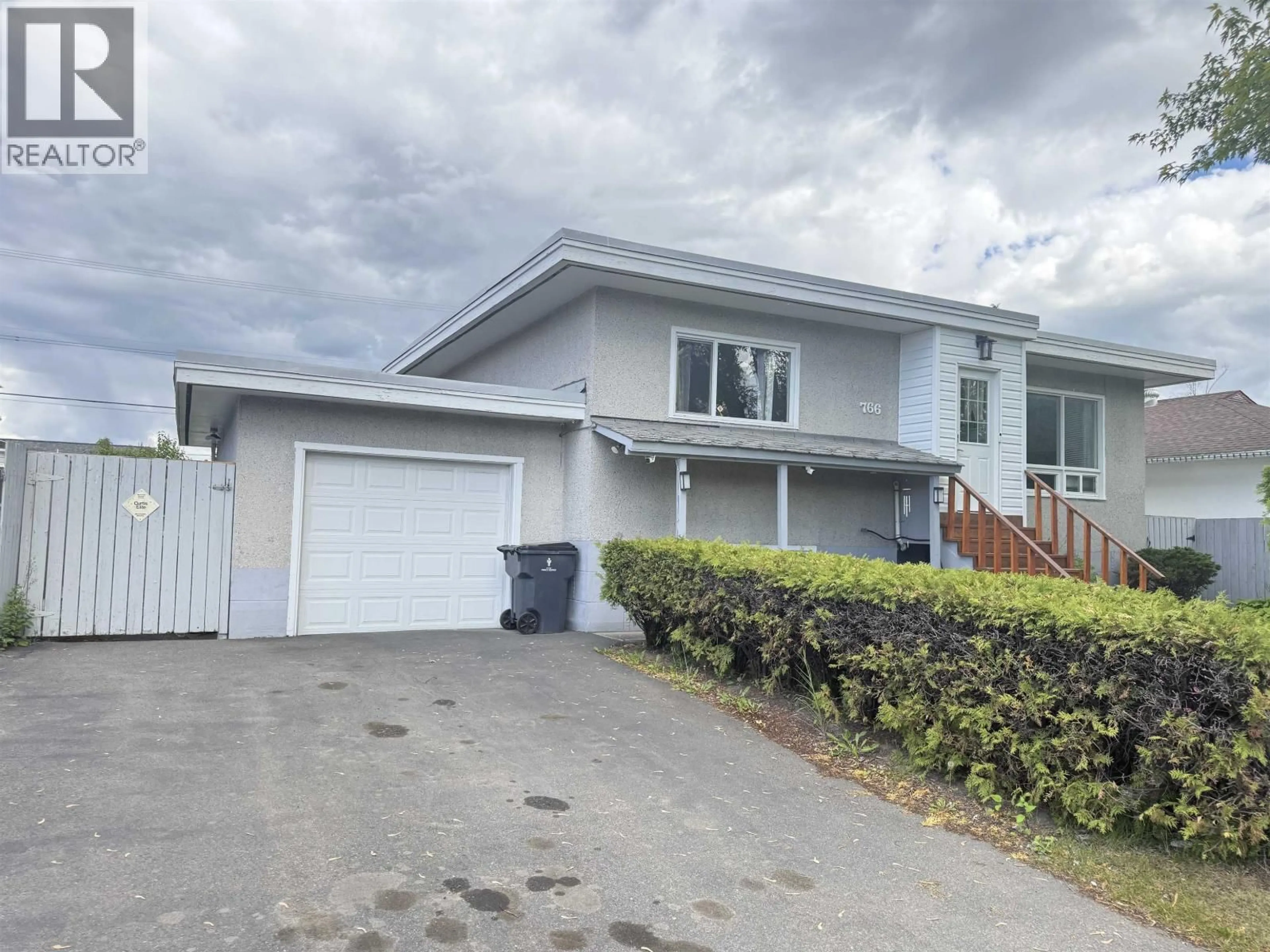 Home with vinyl exterior material, street for 766 CARNEY STREET, Prince George British Columbia V2M2K6