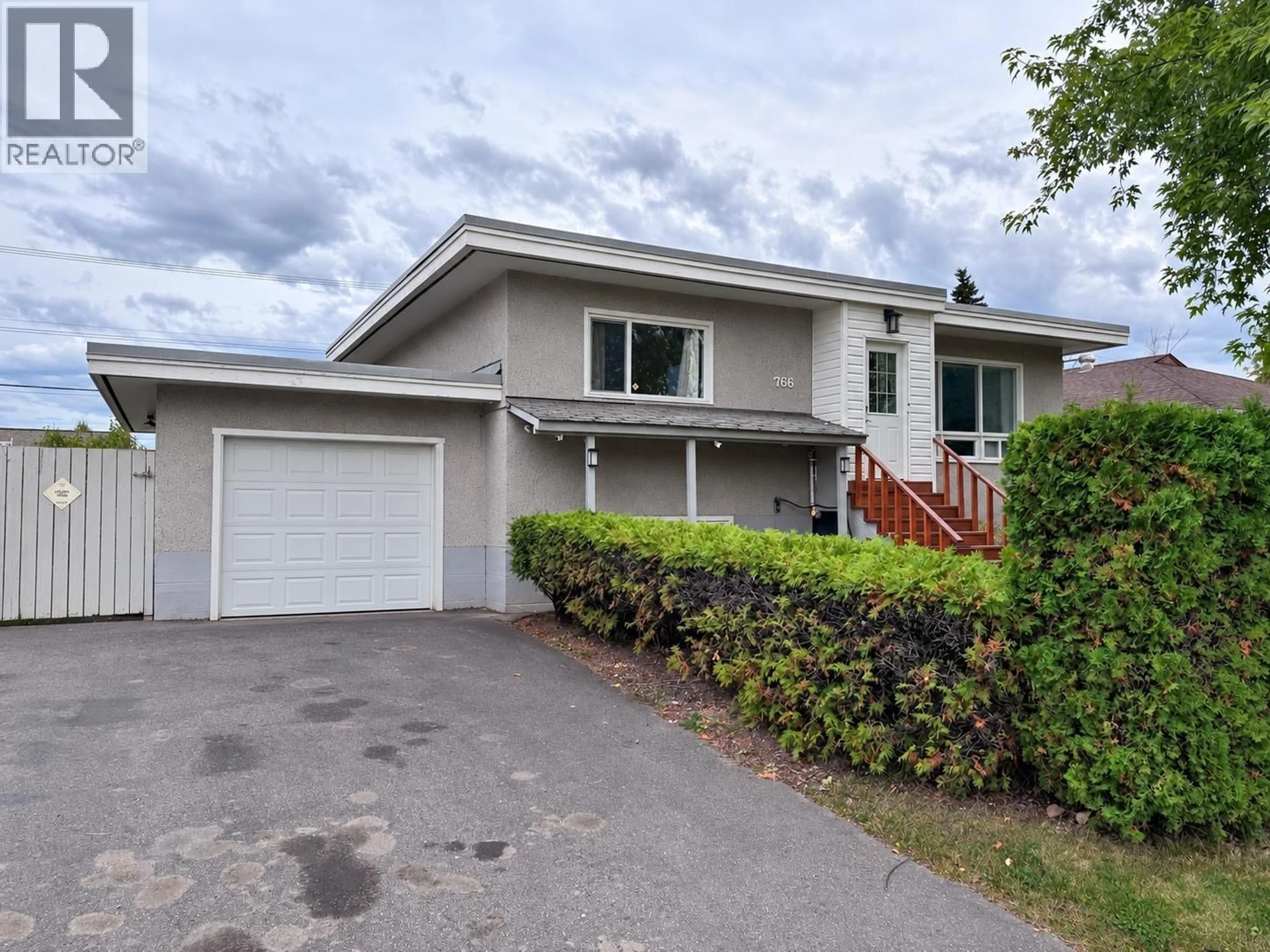 Home with vinyl exterior material, street for 766 CARNEY STREET, Prince George British Columbia V2M2K6