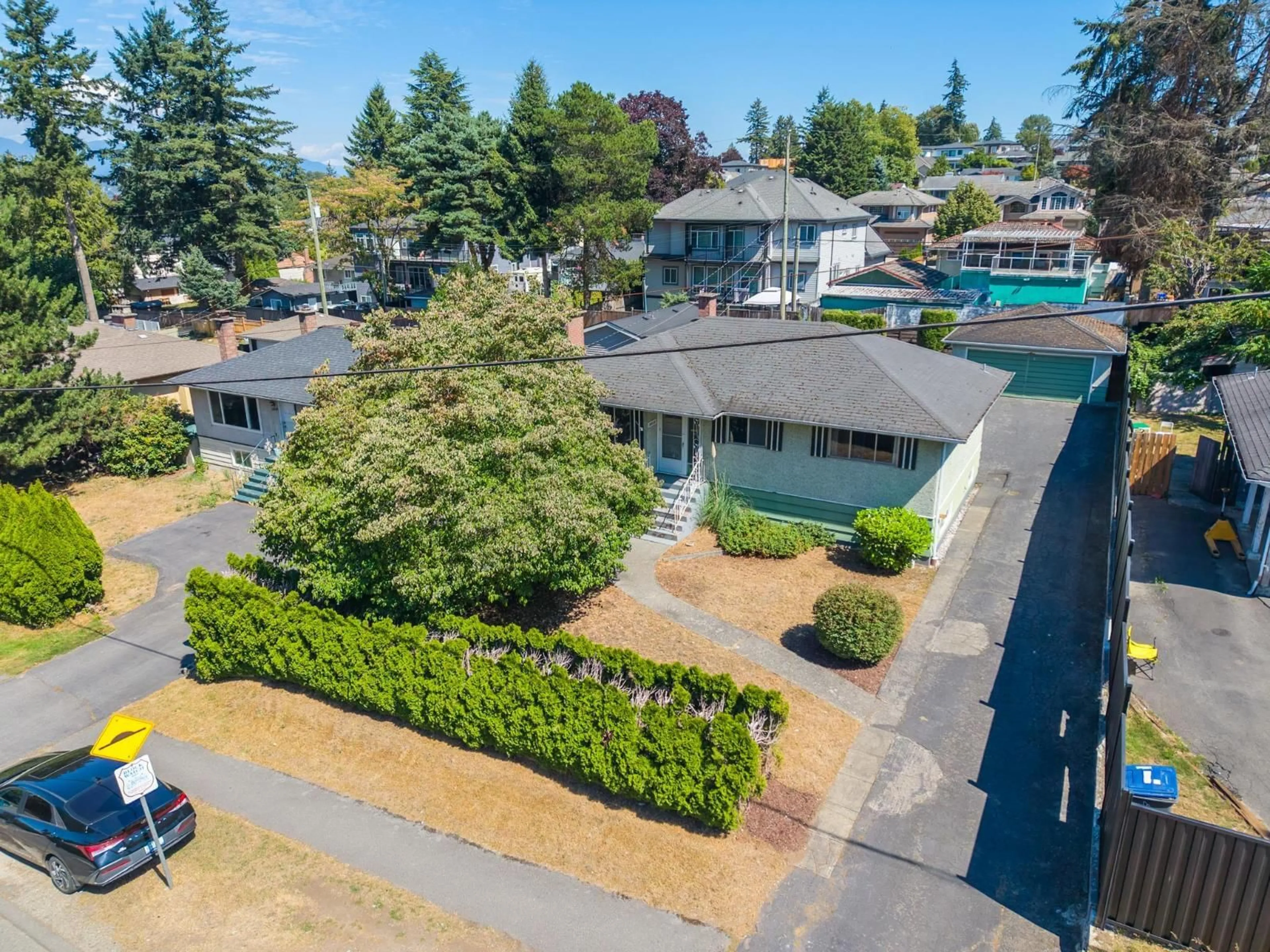 A pic from outside/outdoor area/front of a property/back of a property/a pic from drone, unknown for 10836 128 STREET, Surrey British Columbia V3T3A3