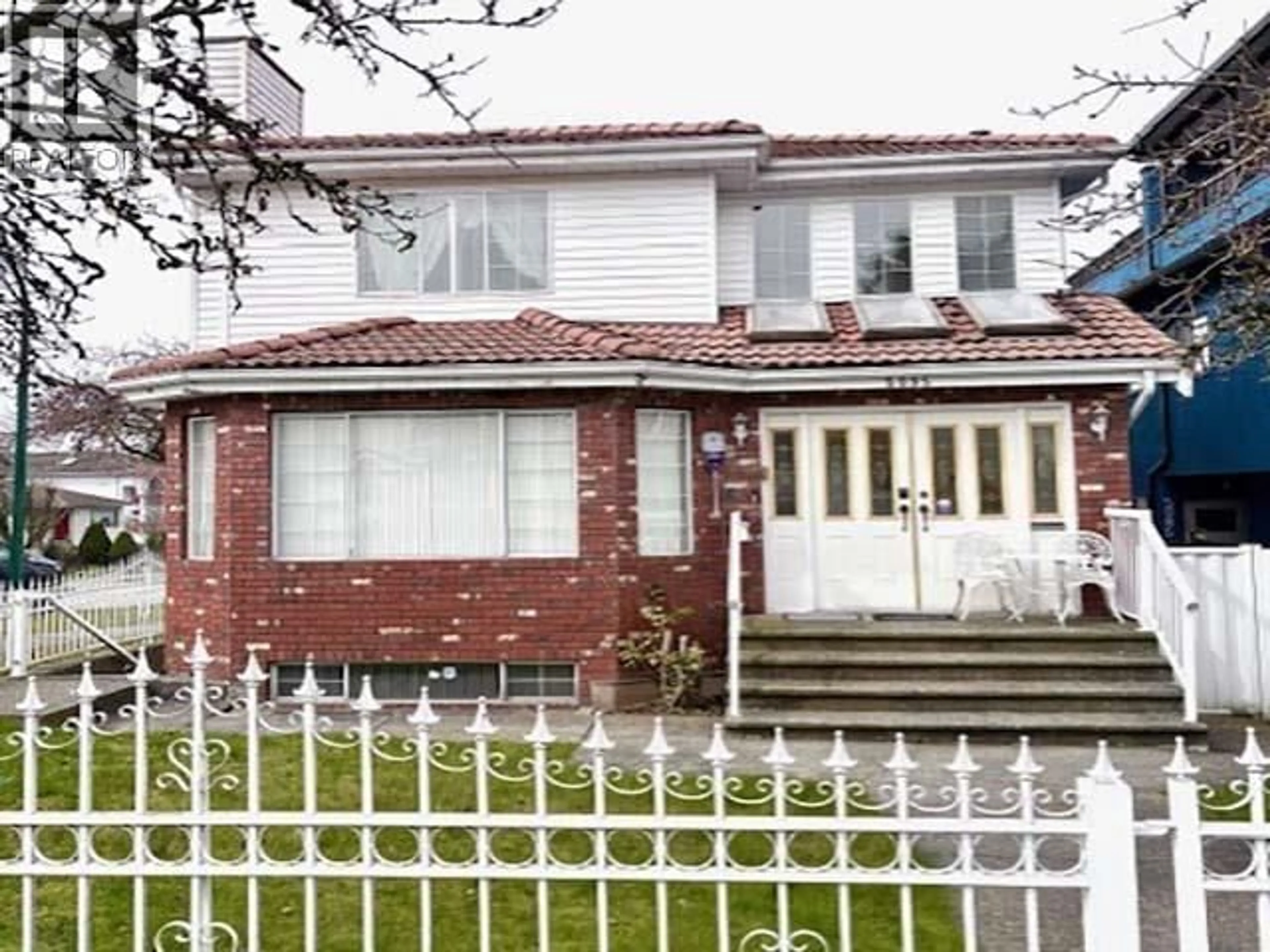 Home with brick exterior material, street for 5095 NANAIMO STREET, Vancouver British Columbia V5P4H9