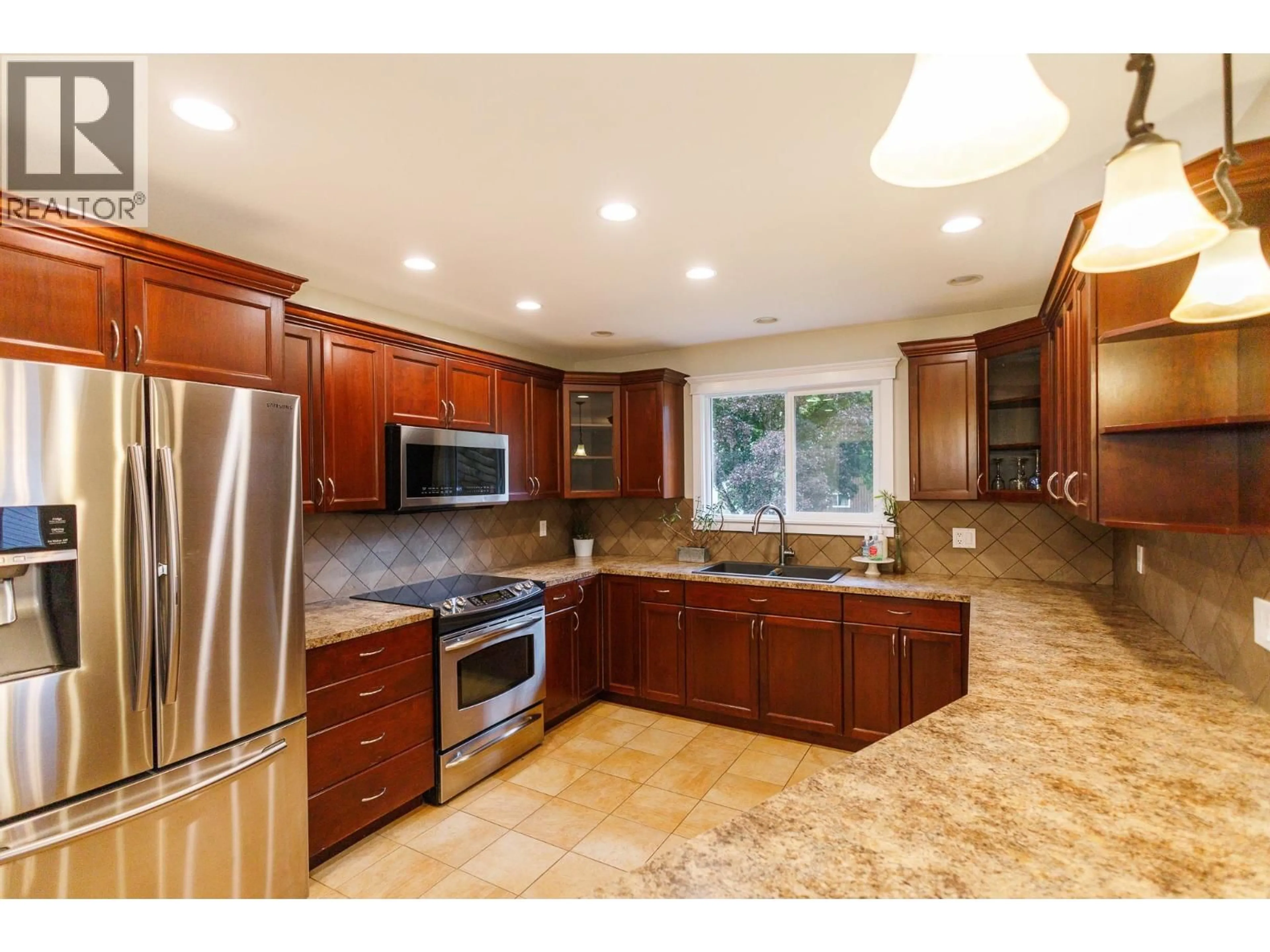 Open concept kitchen, ceramic/tile floor for 4924 LABELLE AVENUE, Terrace British Columbia V8G4M8