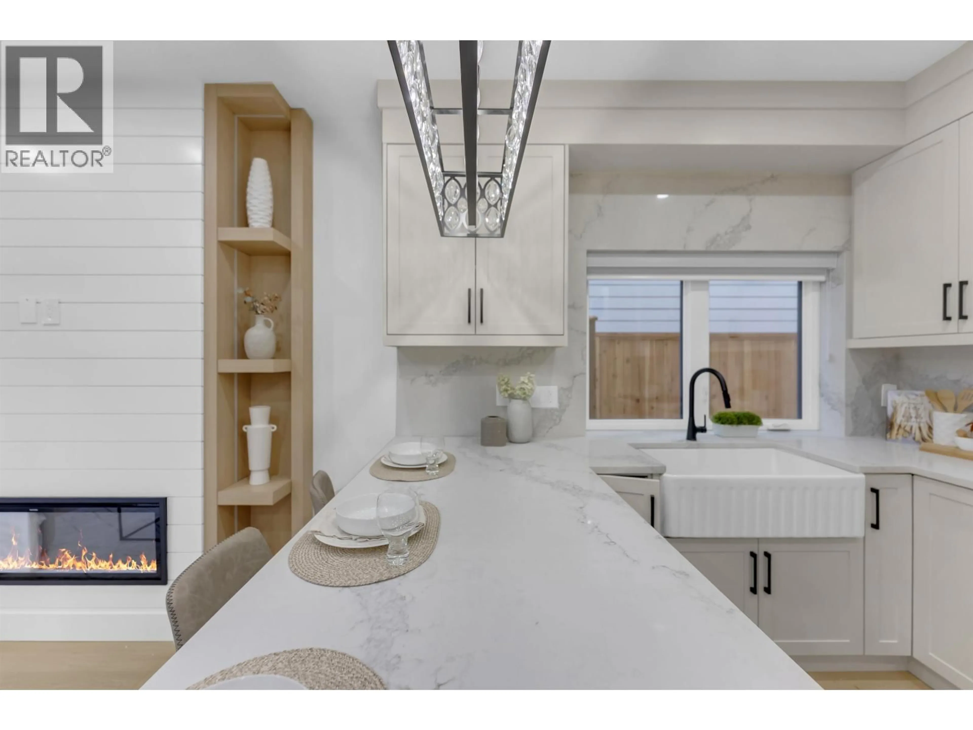 Open concept kitchen, ceramic/tile floor for 2 - 2888 6TH AVENUE, Vancouver British Columbia V5M1R8