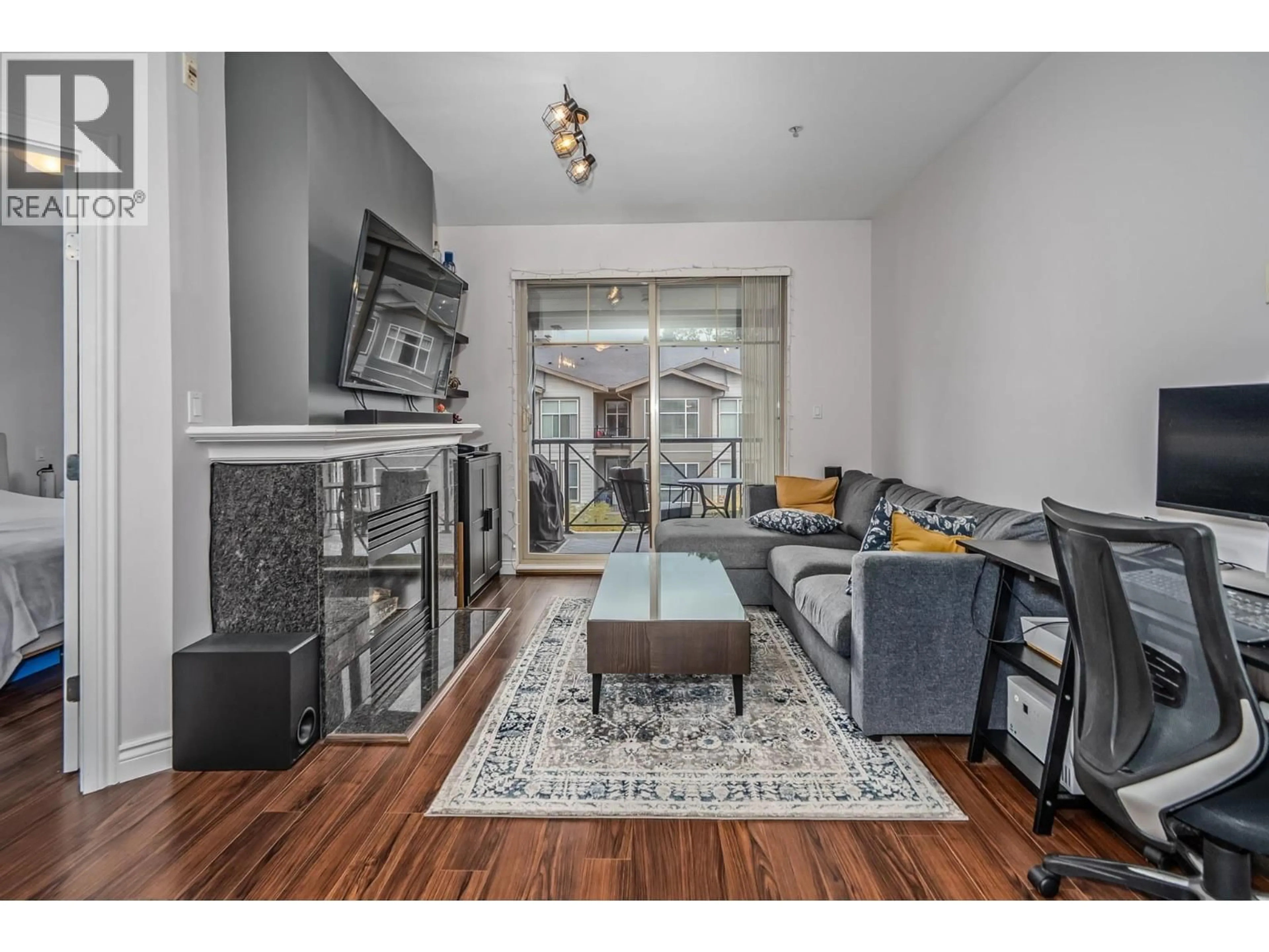 Living room with furniture, unknown for 408 - 2330 WILSON AVENUE, Port Coquitlam British Columbia V3C1Z6