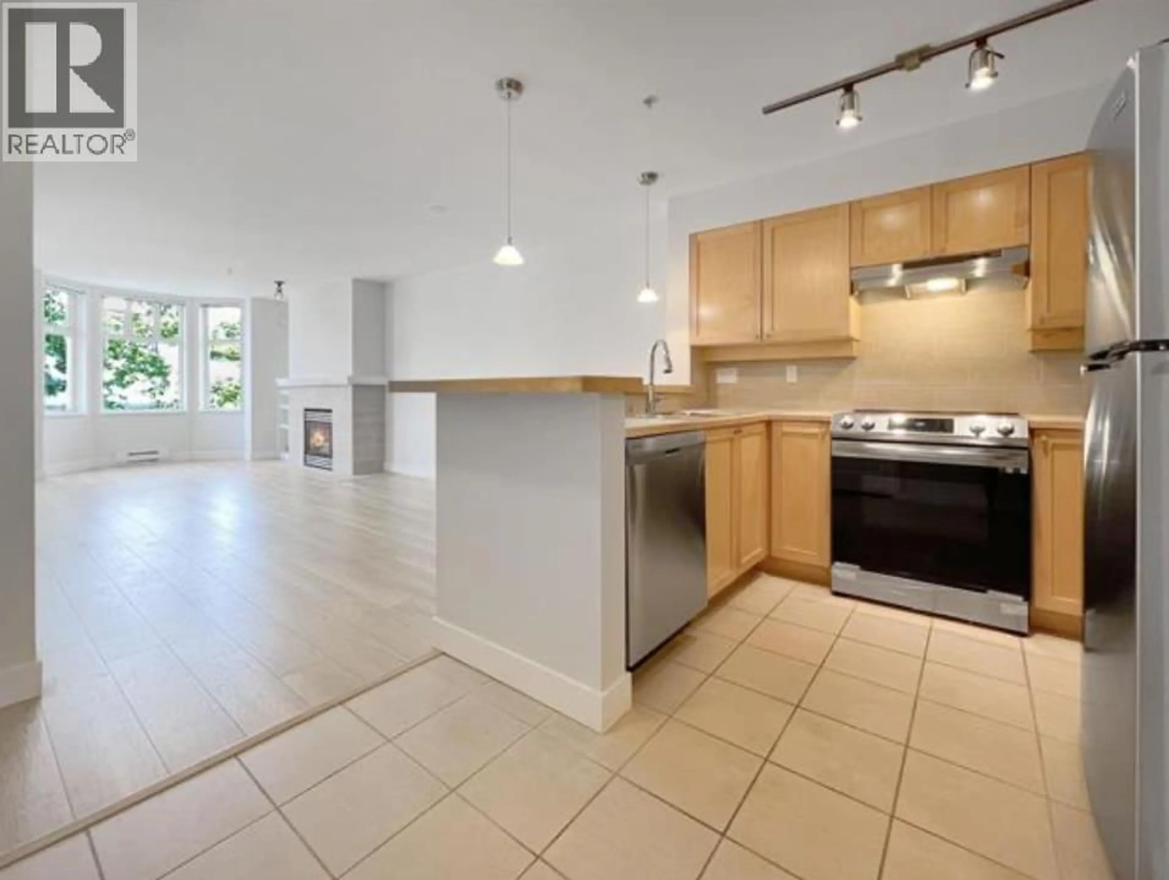 Open concept kitchen, ceramic/tile floor for 208 - 3580 41ST AVENUE, Vancouver British Columbia V6N3E6