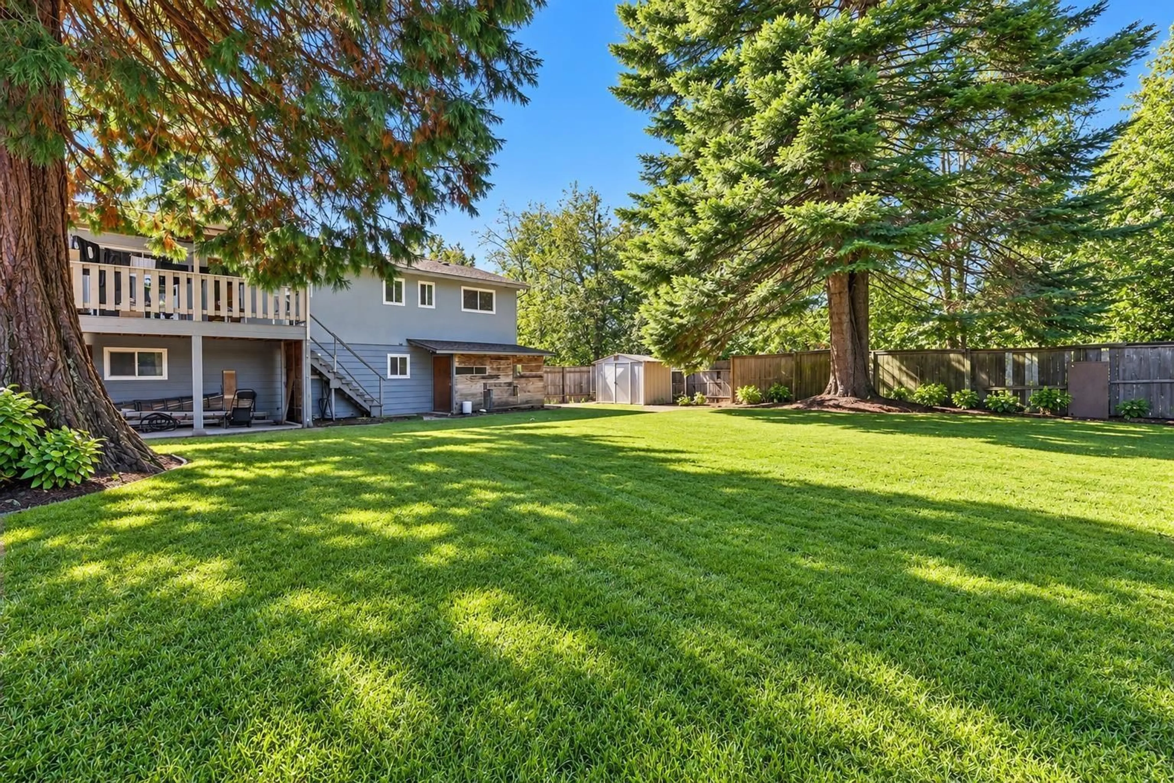 A pic from outside/outdoor area/front of a property/back of a property/a pic from drone, unknown for 12513 91 AVENUE, Surrey British Columbia V3V6B4