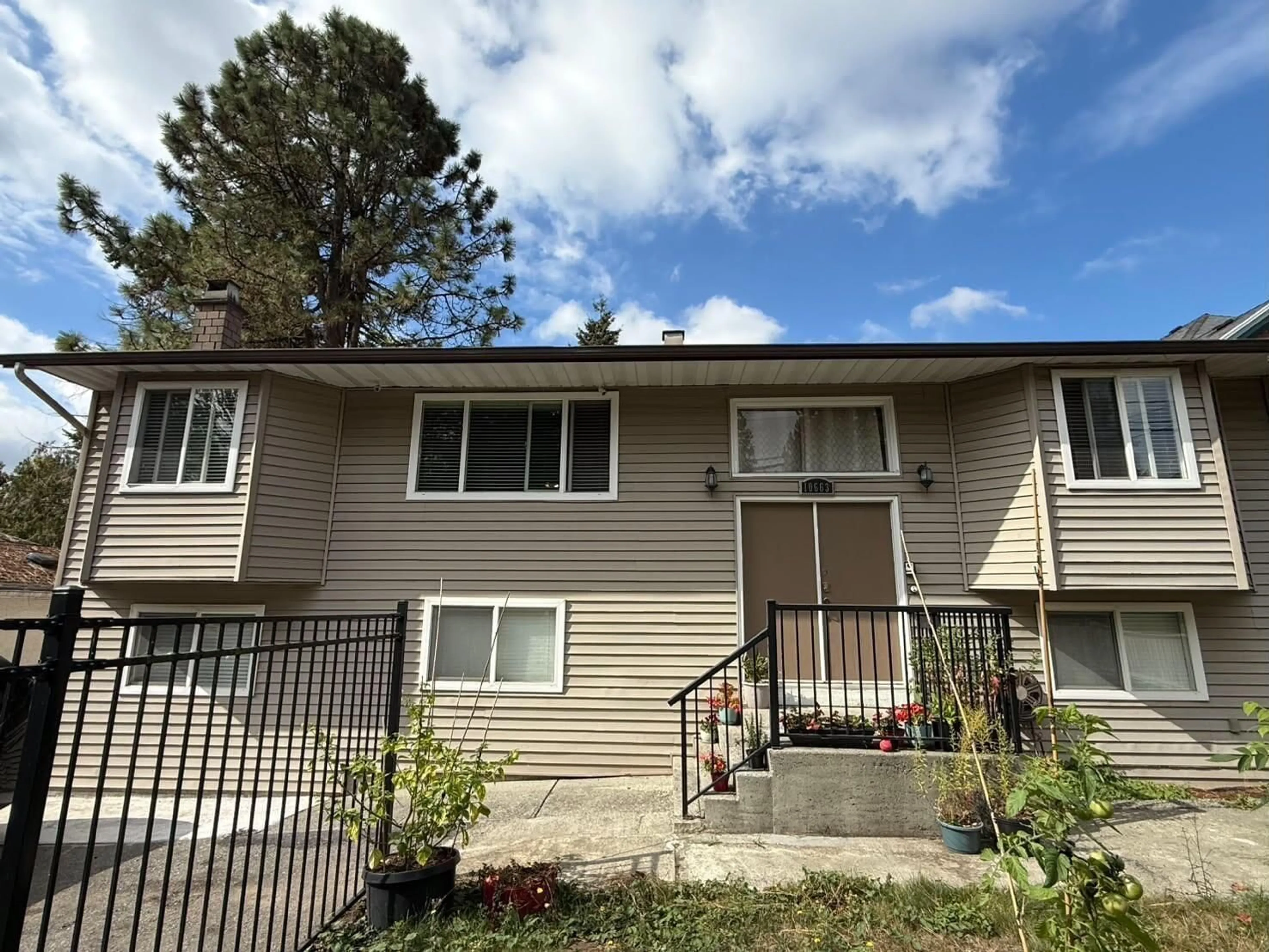 Home with vinyl exterior material, street for 10663 138 STREET, Surrey British Columbia V3T4K7