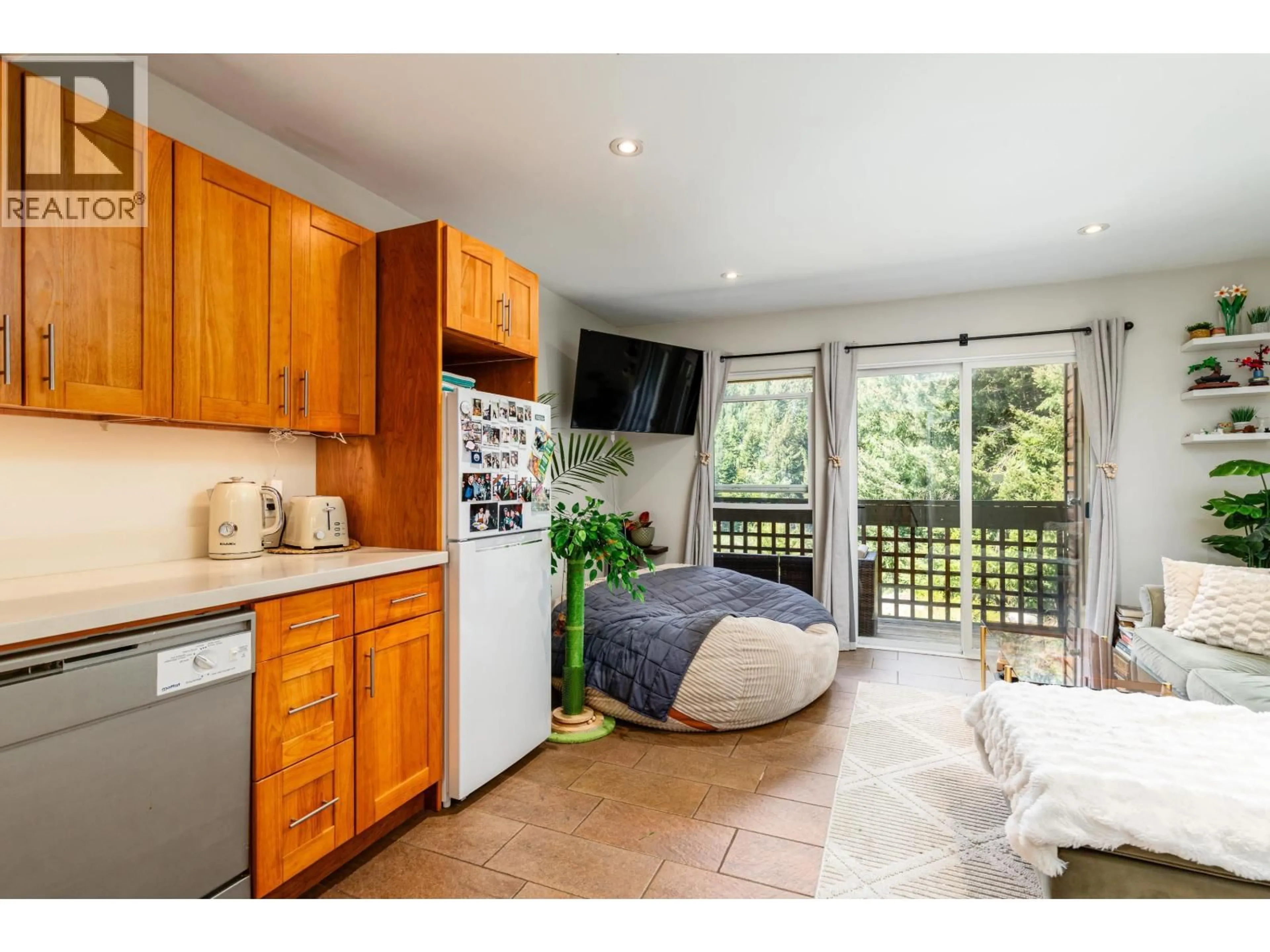 Open concept kitchen, ceramic/tile floor for 7 - 7001 NESTERS ROAD, Whistler British Columbia V8E0X1